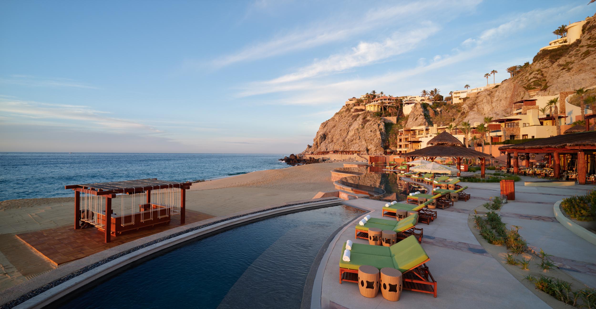 Cascading beachfront infinity swimming pool