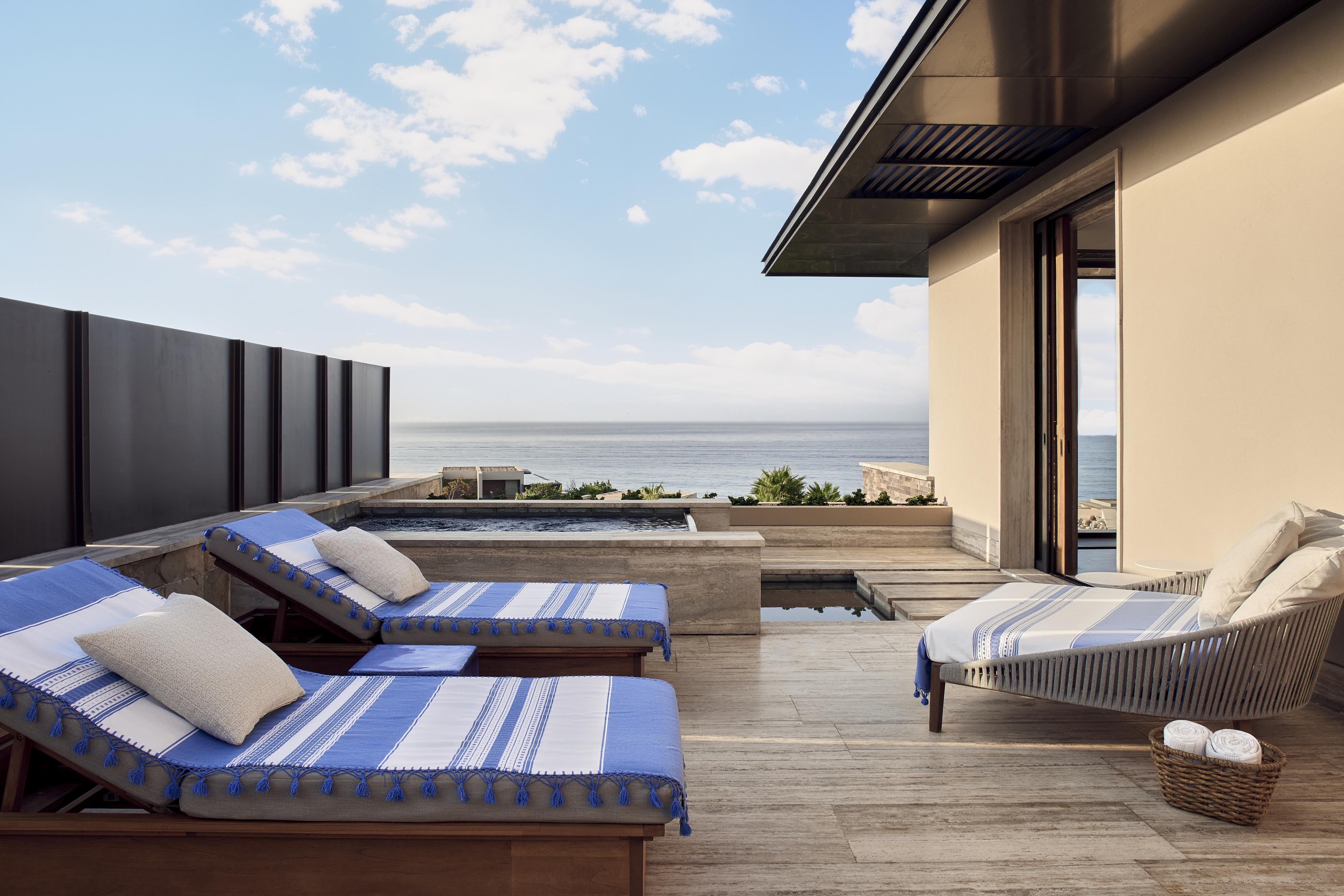 Private pavilion terrace with heated plunge pool and daybed