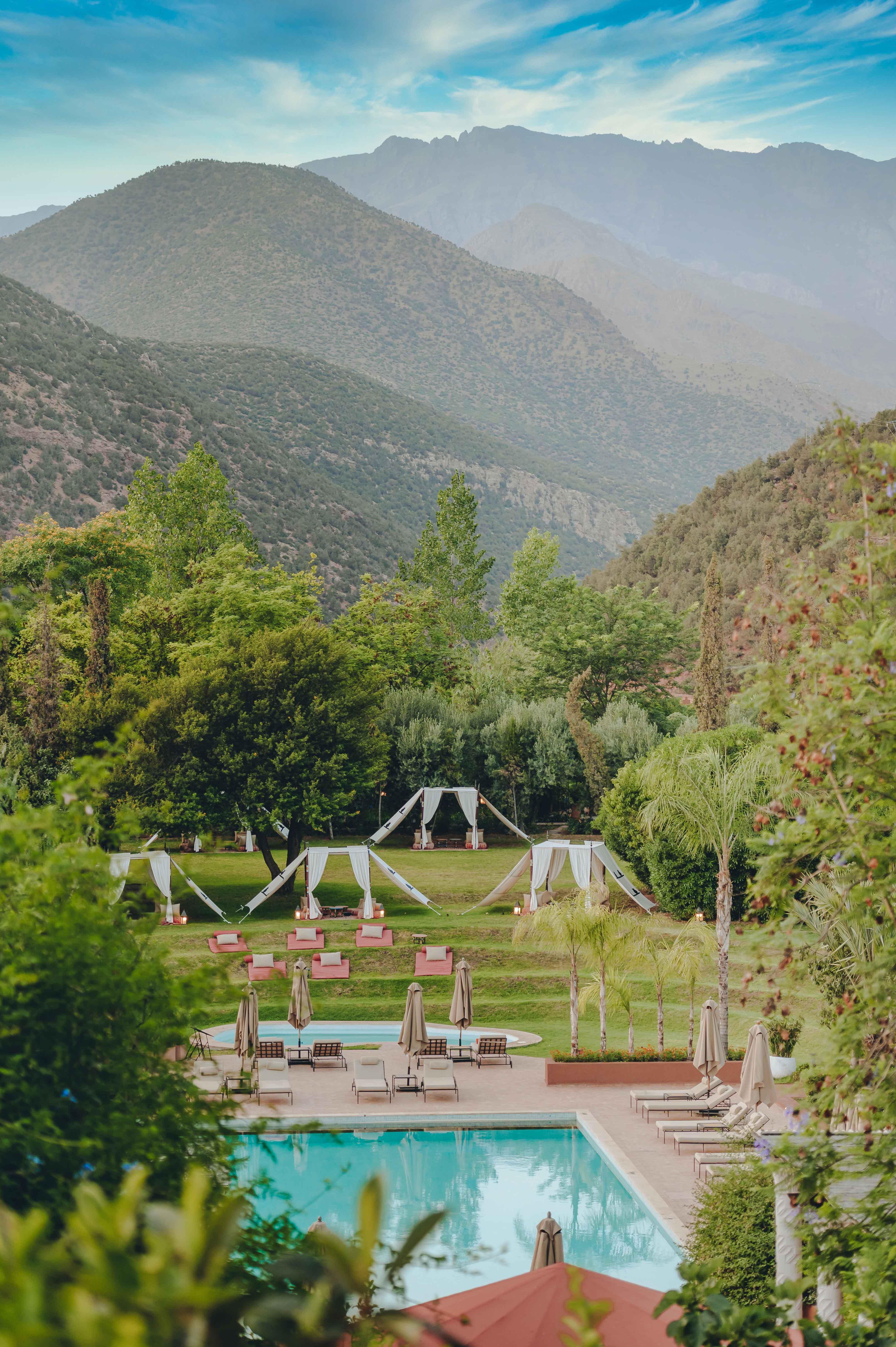Heated Infinity Pool with Sun Loungers and Valley Views