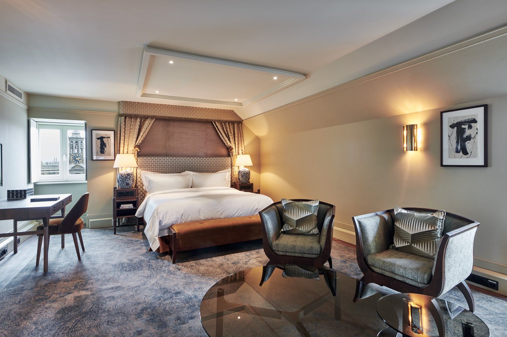 Junior Suite with private balcony overlooking the Amstel river and classic Dutch decor