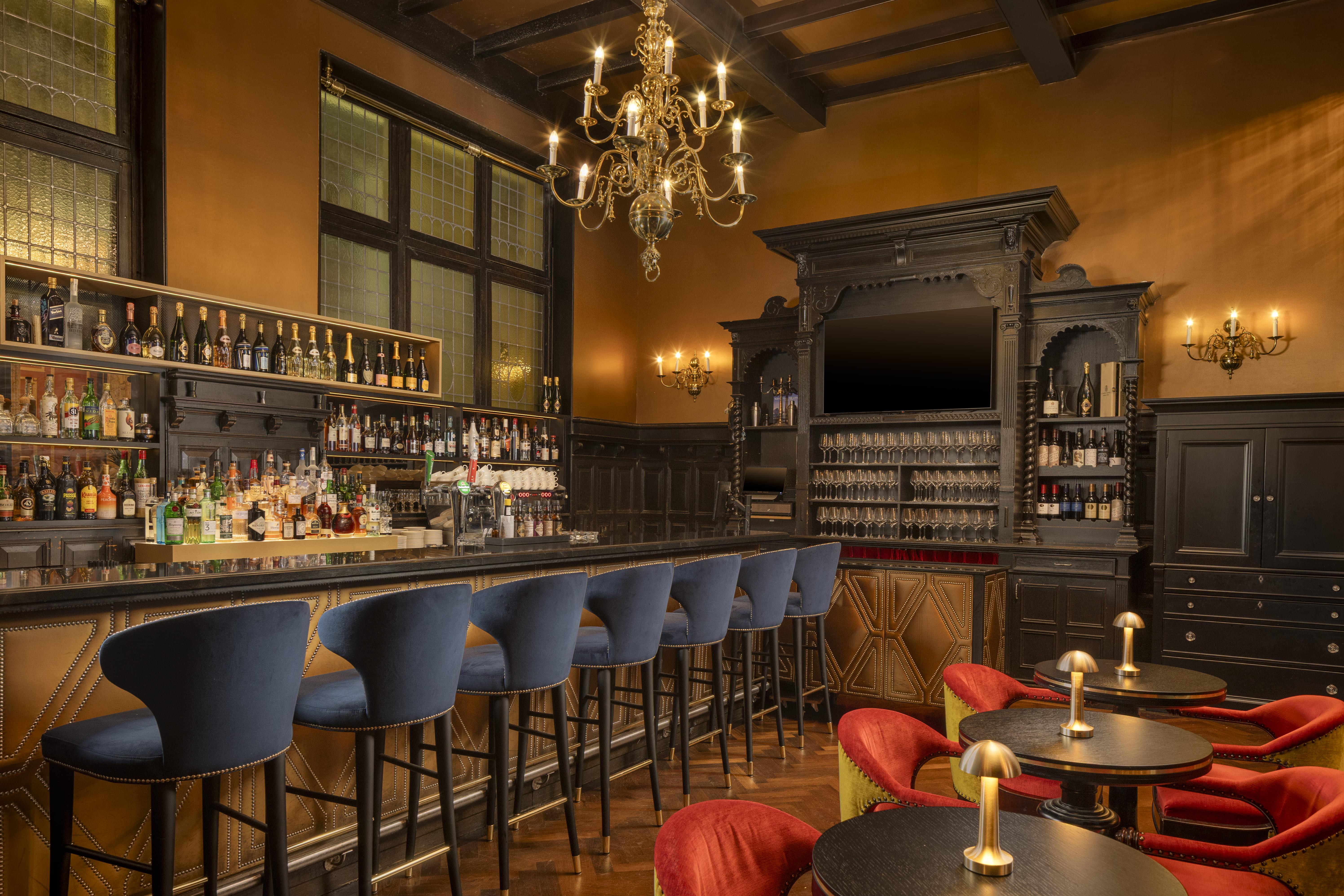 The intimate Des Indes Bar offering artisanal cocktails, rare whiskies, and fine wines