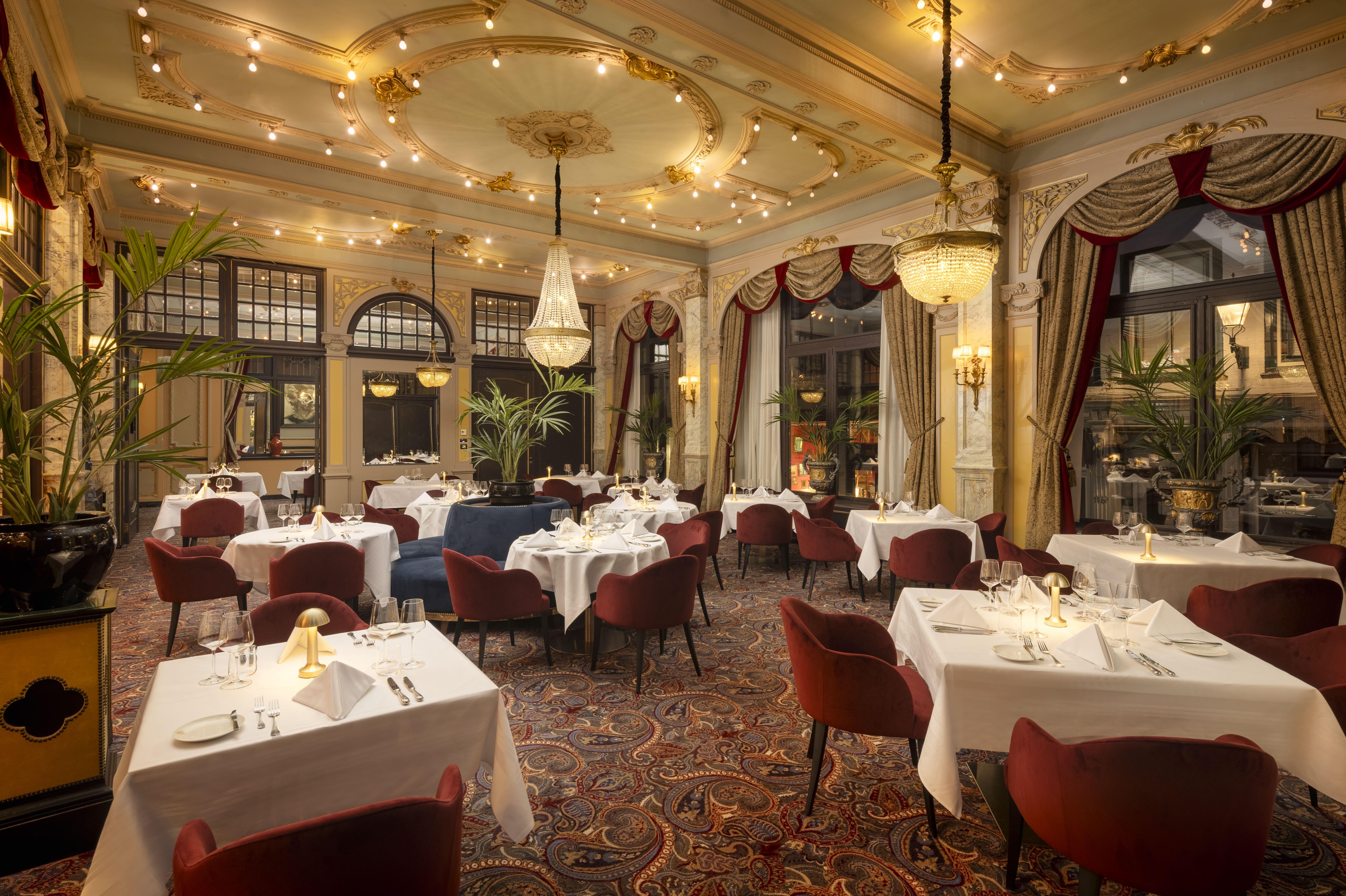 Restaurant Des Indes fine dining salon with Jacques Garcia crimson velvet design