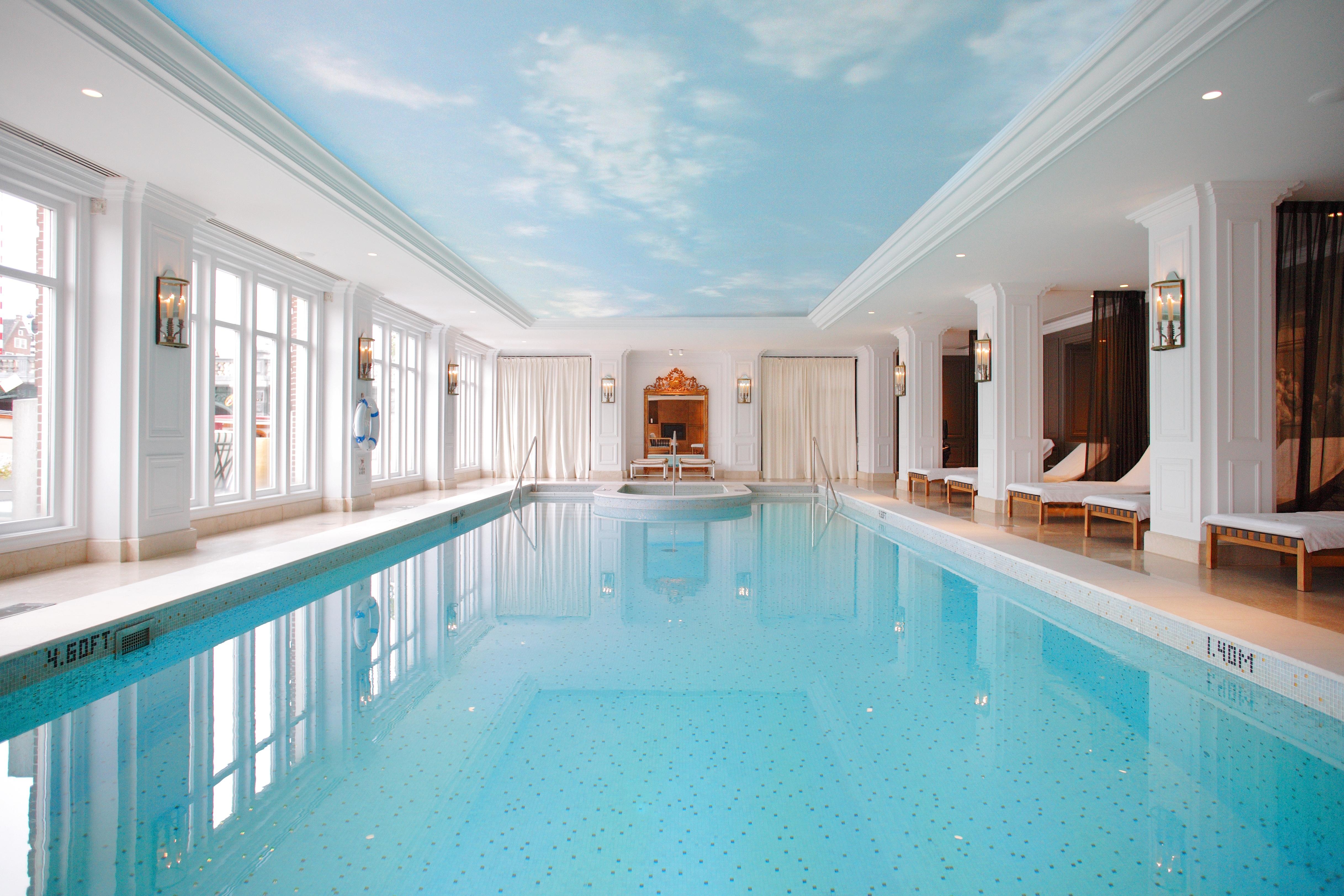 Health and Fitness Club indoor swimming pool situated at water level with the Amstel River