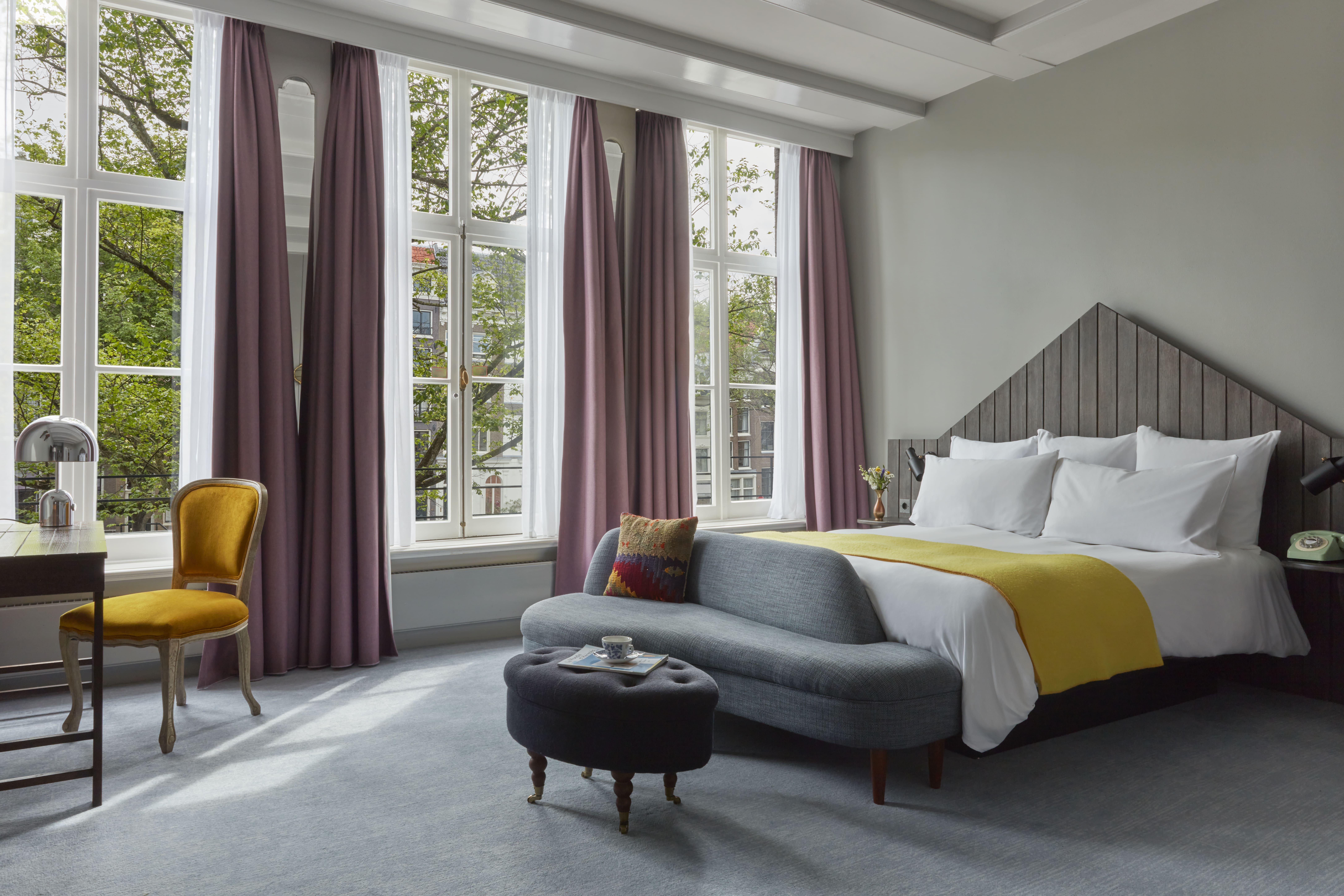 Generous King Canal View room with direct views over Prinsengracht canal and artisanal Dutch detailing