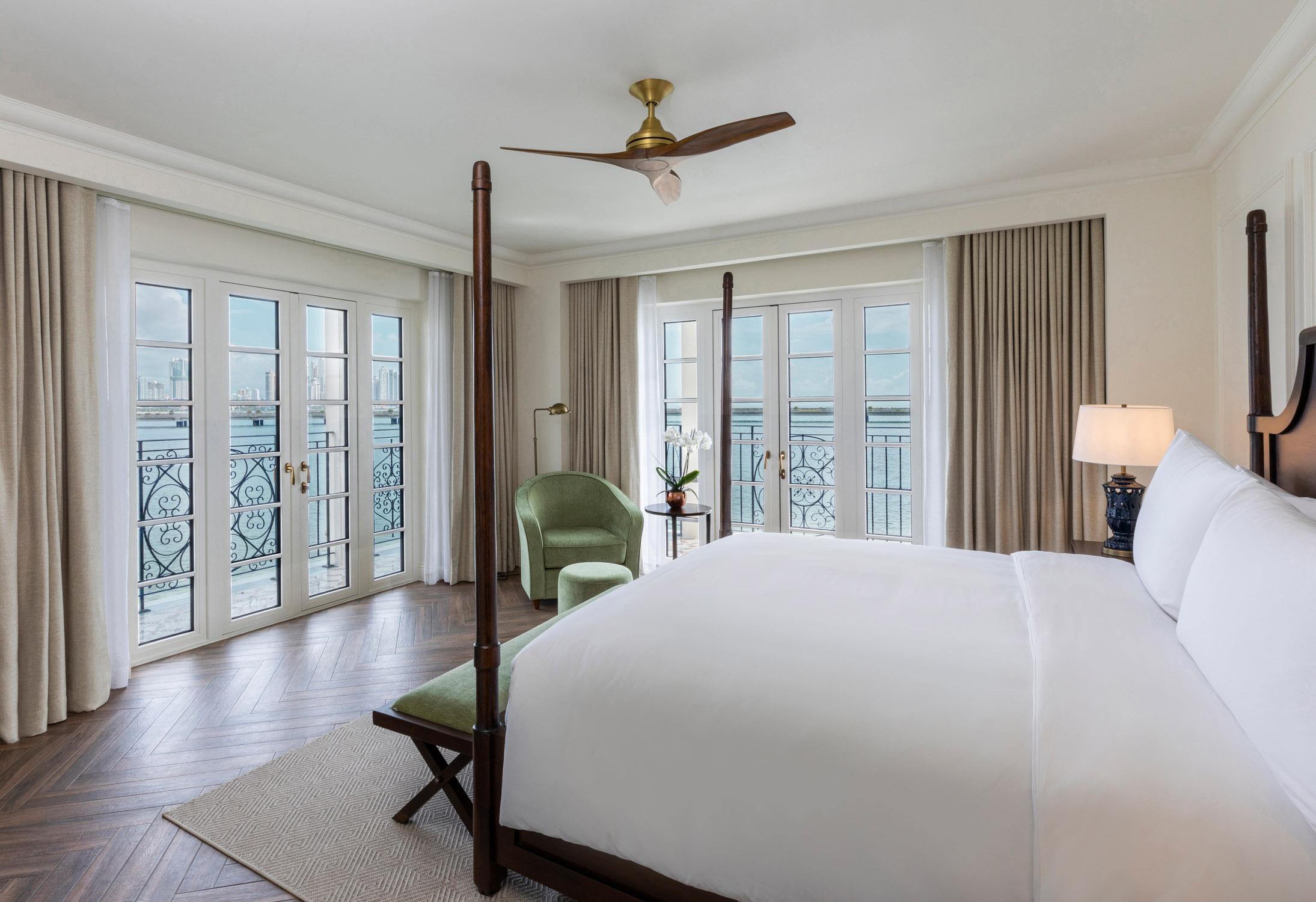 Ocean Front Legendary One-Bedroom Suite living room with panoramic Pacific views and balcony