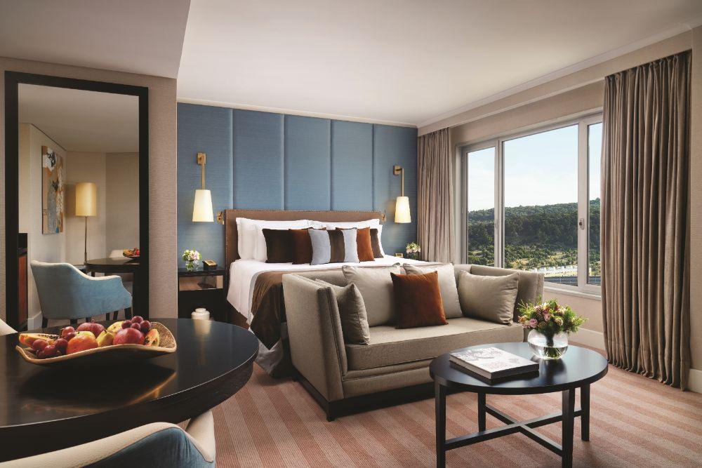 Luxurious Park View Suite with Floor-to-Ceiling Windows and Marble Bath