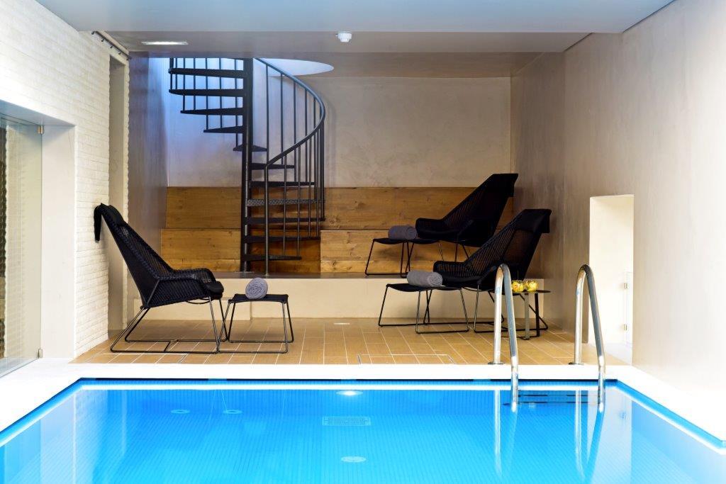 Wellness Center Heated Indoor Swimming Pool with Vaulted Ceilings
