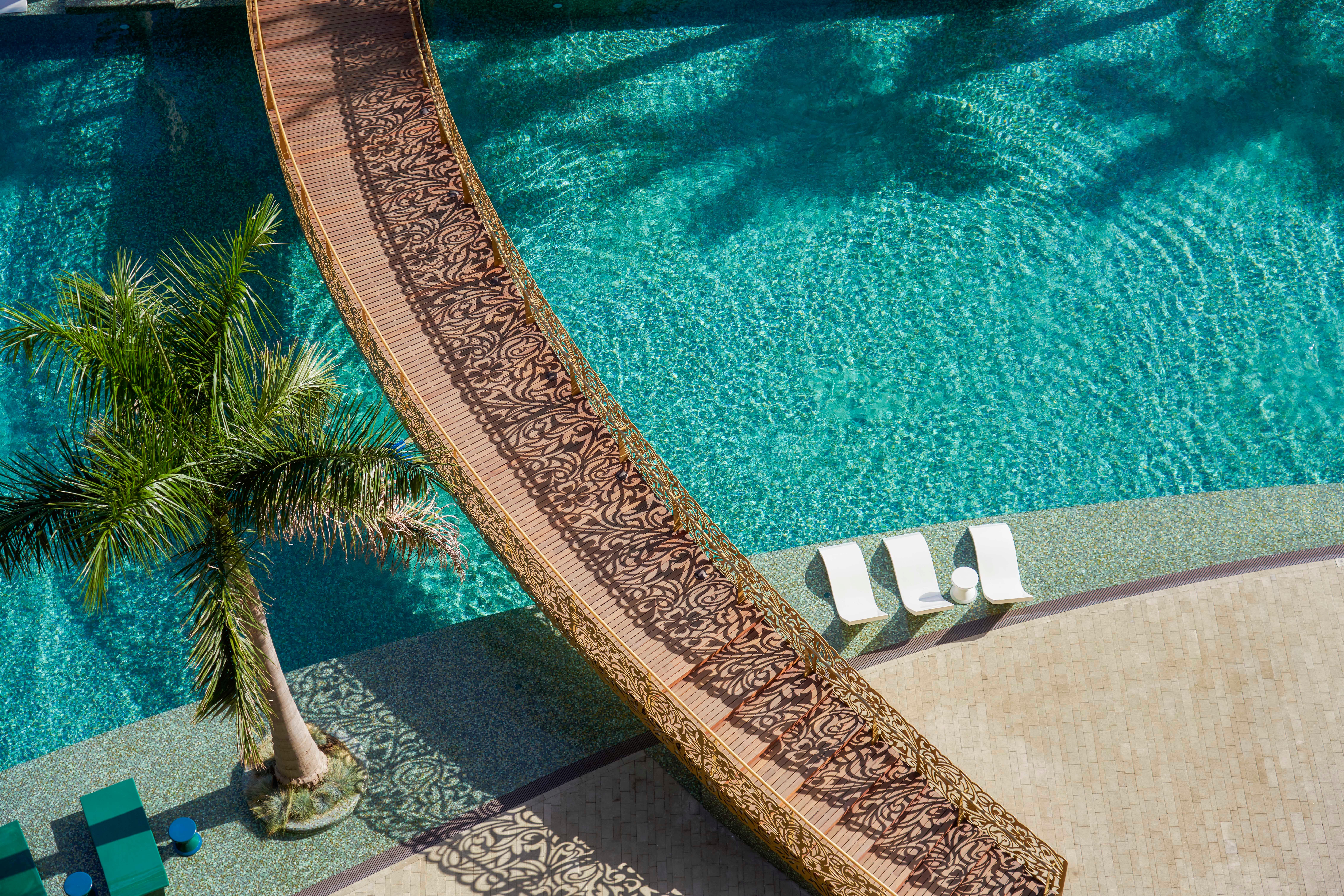 Savoy Palace Expansive Lagoon Swimming Pool Surrounded by Tropical Gardens