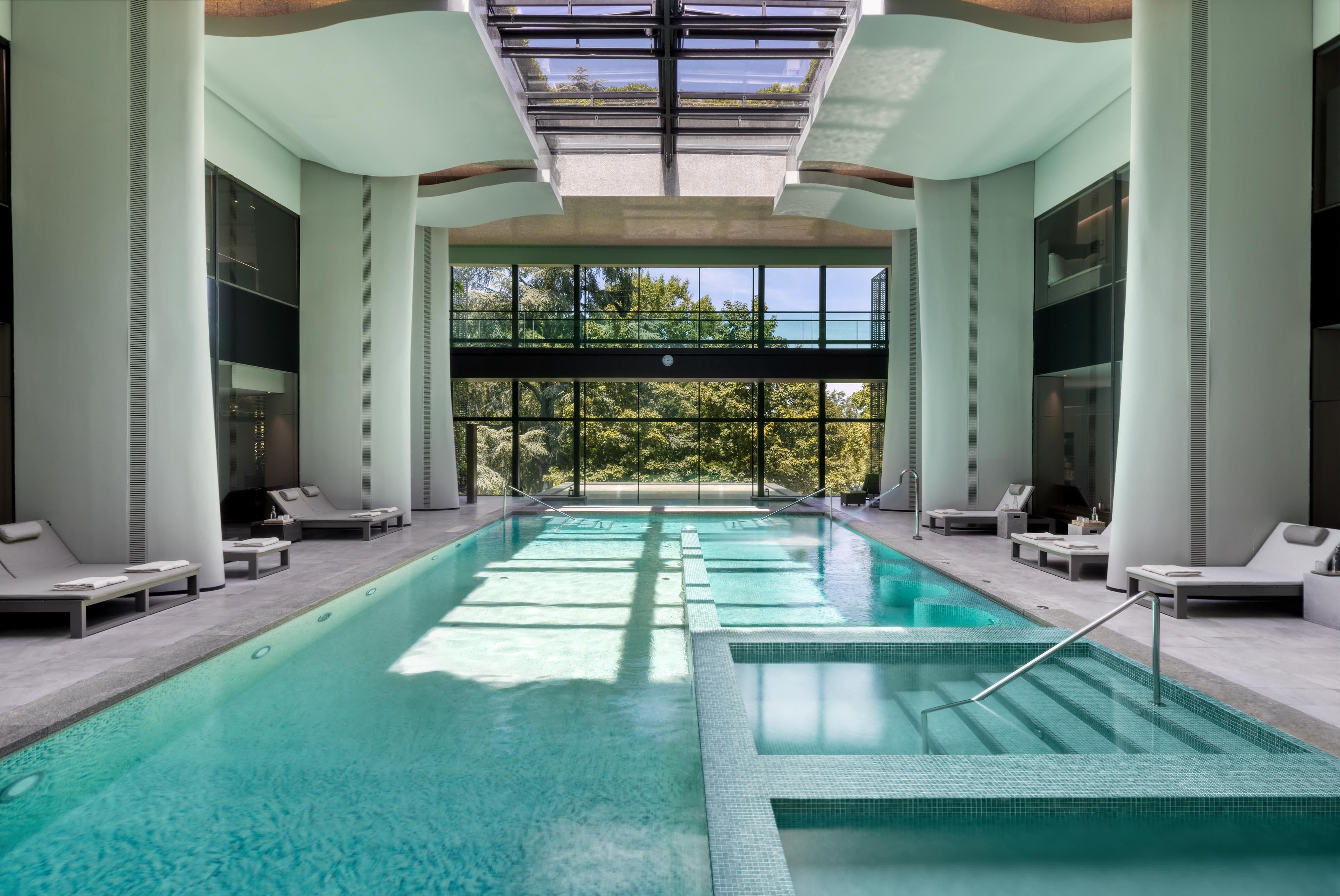 Six Senses Spa Heated Indoor Vitality Pool with Floor-to-Ceiling Forest Views