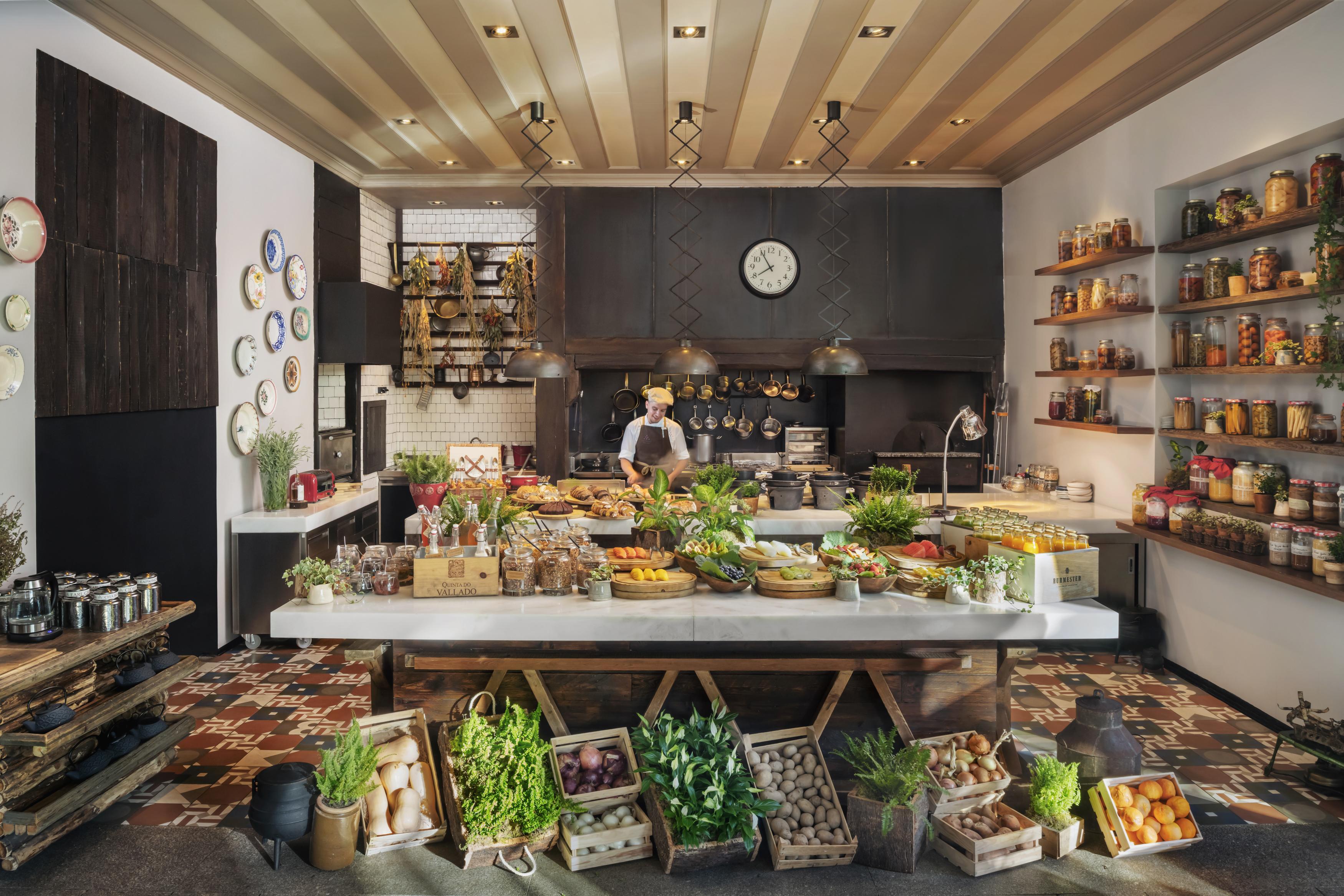 The Open Kitchen and Terrace with Traditional Wood-Fired Oven and Cooking Island