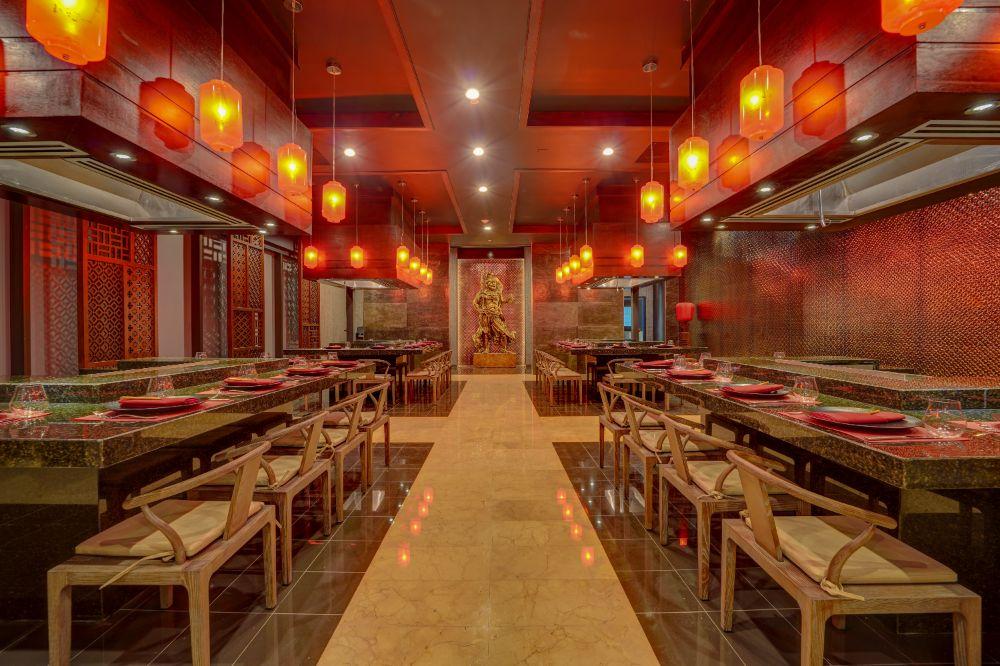 Nori Asian Grill vibrant teppanyaki dining stations and fresh handcrafted sushi bar