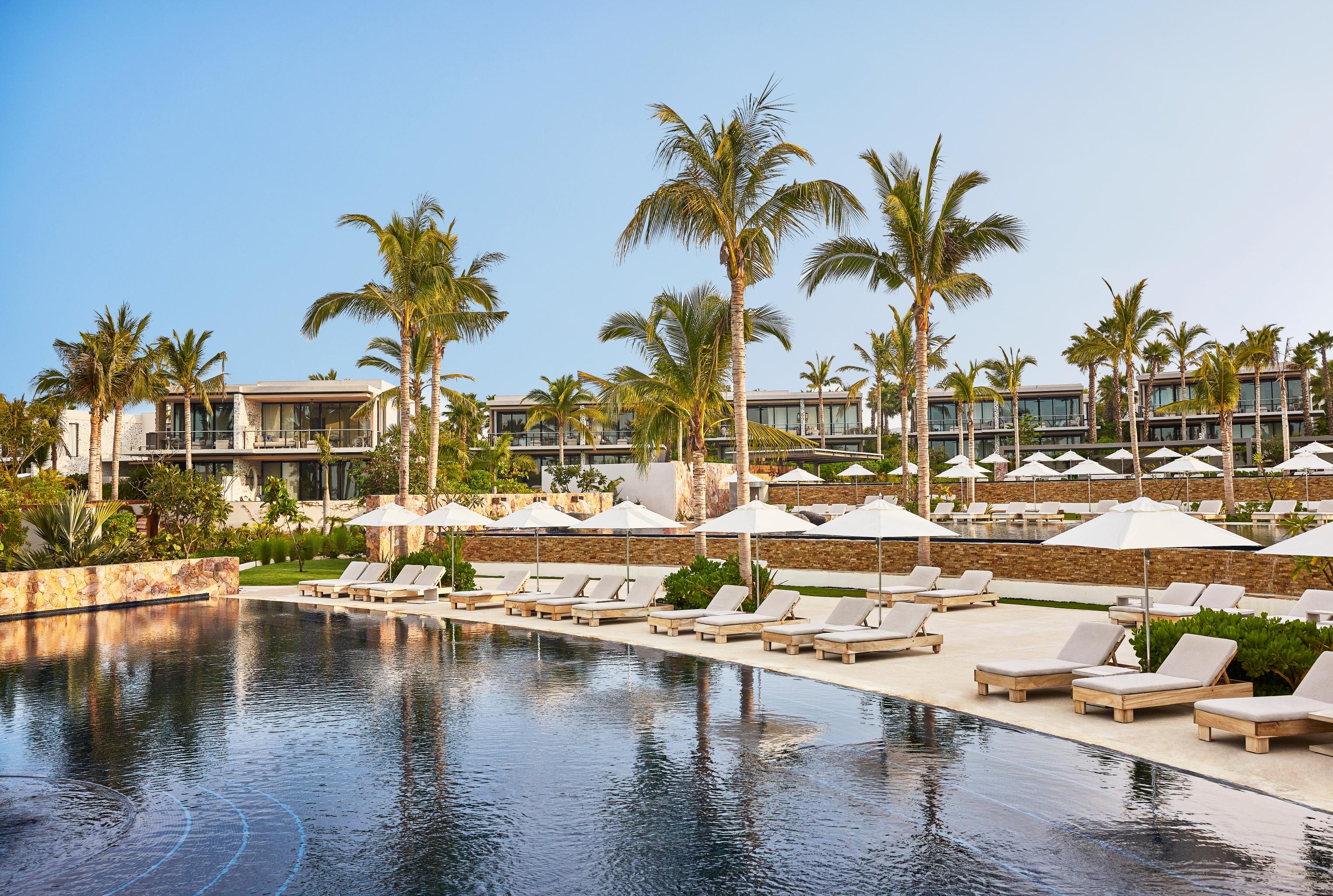 Three tiered cascading infinity pools to the beach