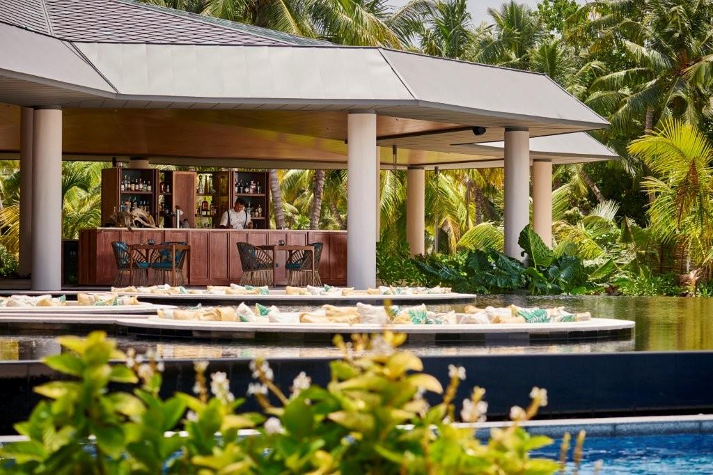 Torti Pool Deck with In-Water Sun Loungers