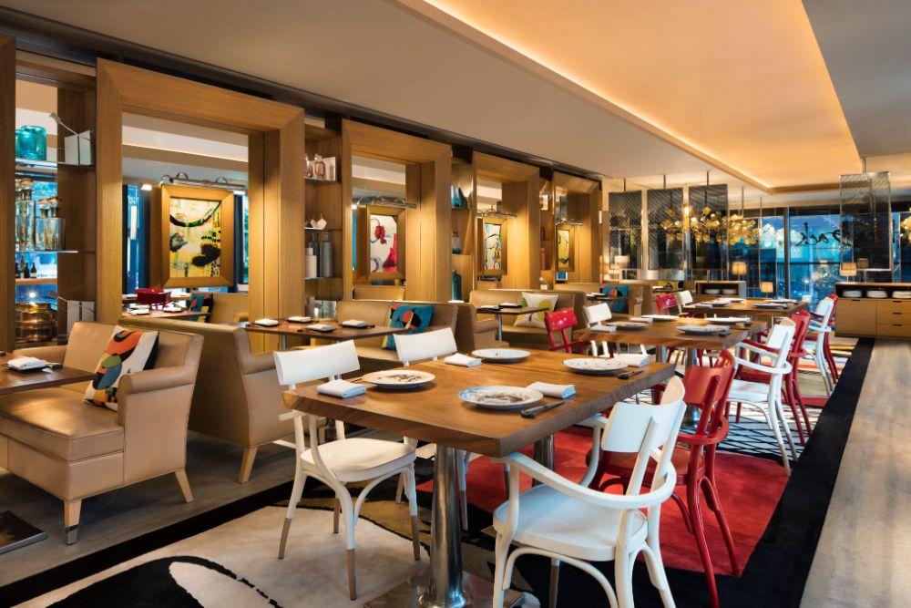 Akira Back restaurant dining room and art installation