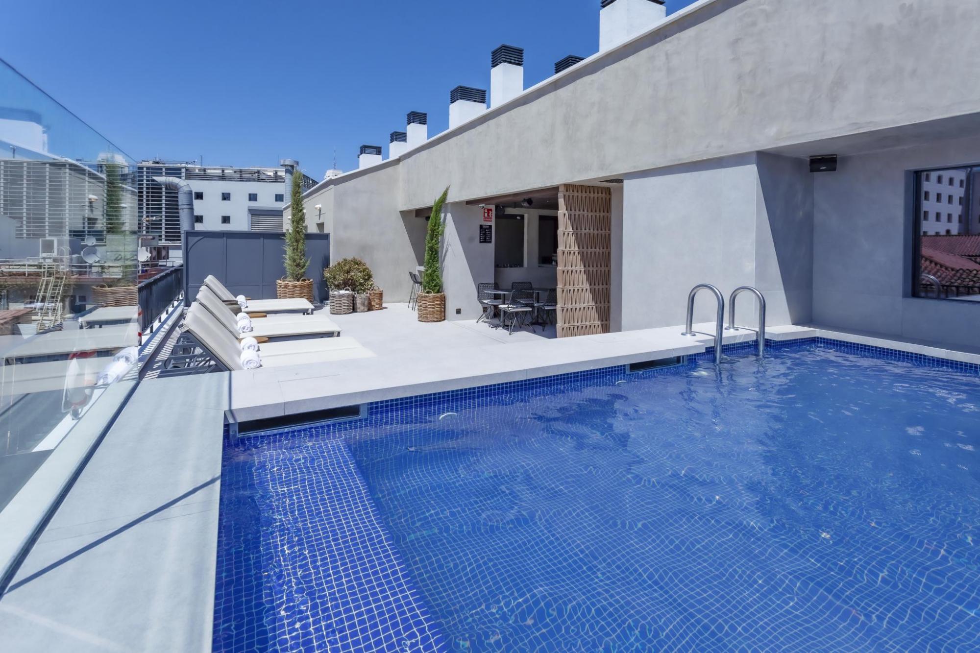 Rooftop Solarium and Madrid Skyline Views
