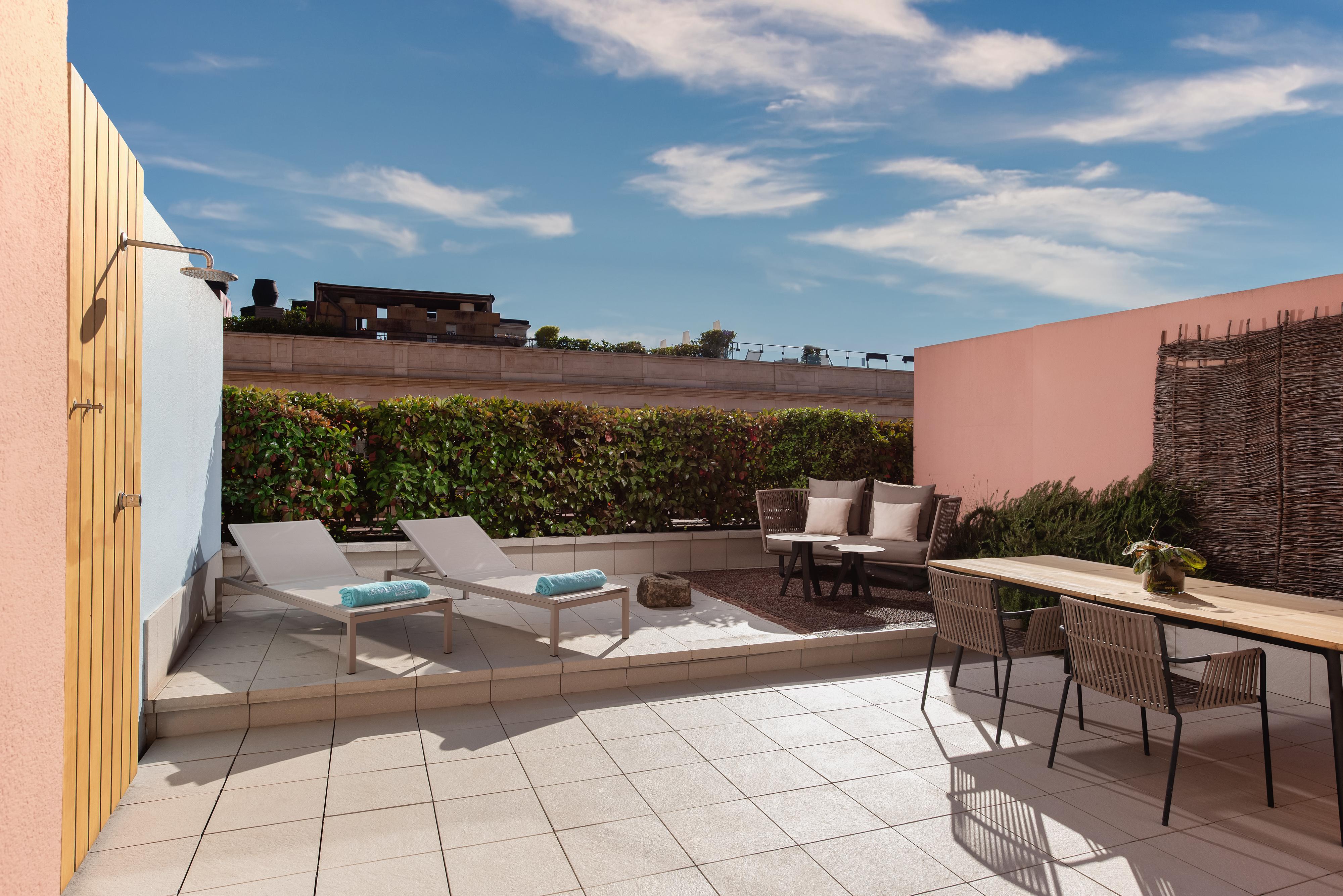 Private outdoor terrace of the Grand Terrace Suite at Le Méridien Barcelona