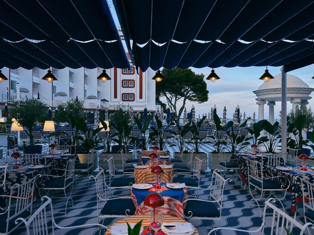 Evening ambiance and illuminated cocktail terrace at Mongibello Ibiza