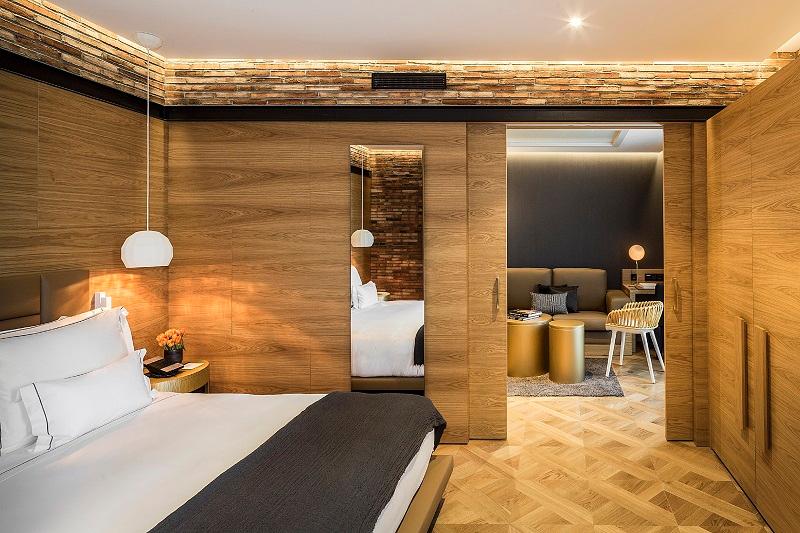 Suite Paseo de Gracia bedroom and balcony at Monument Hotel Barcelona