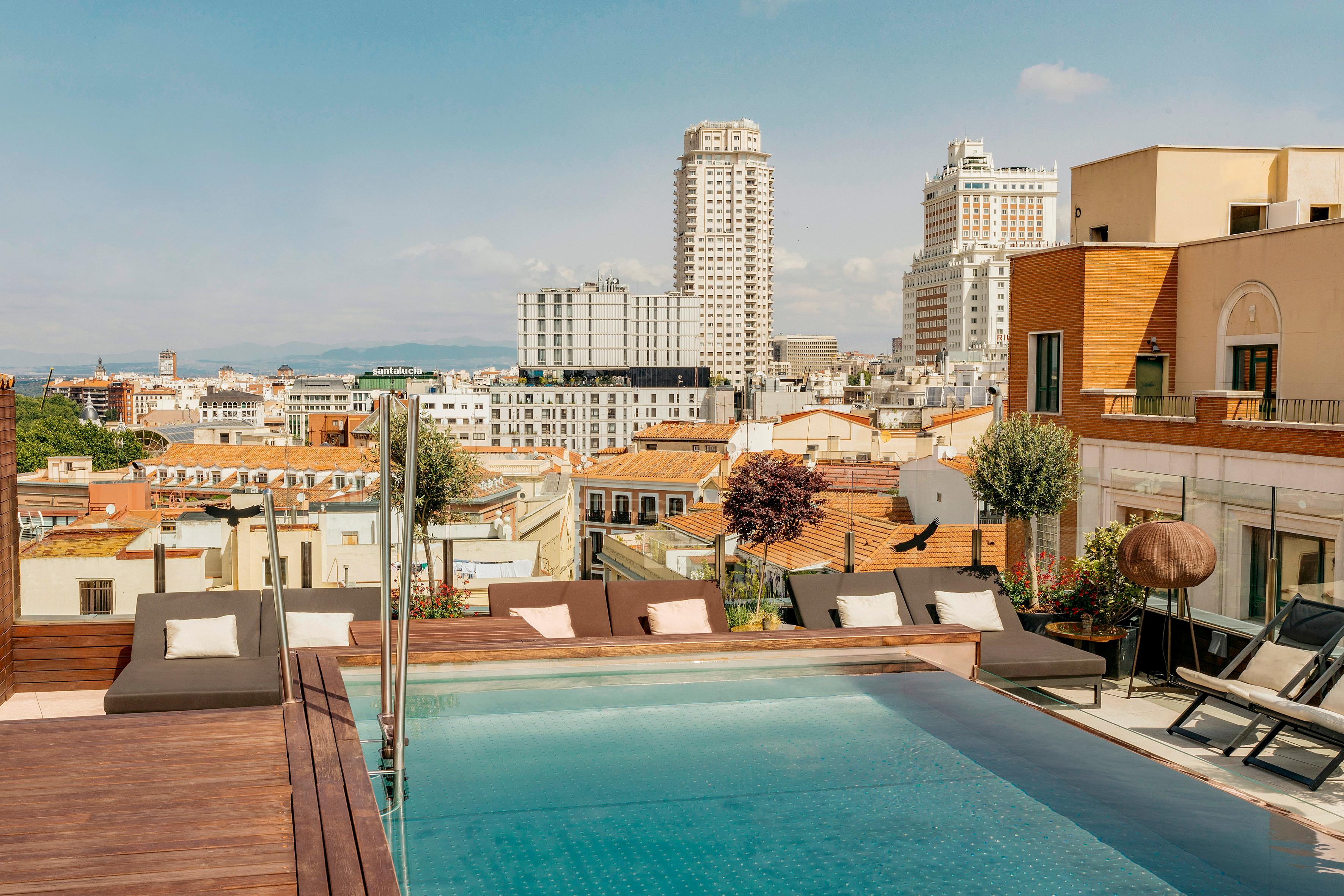 Rooftop swimming pool and sun deck with 360° views across Madrid