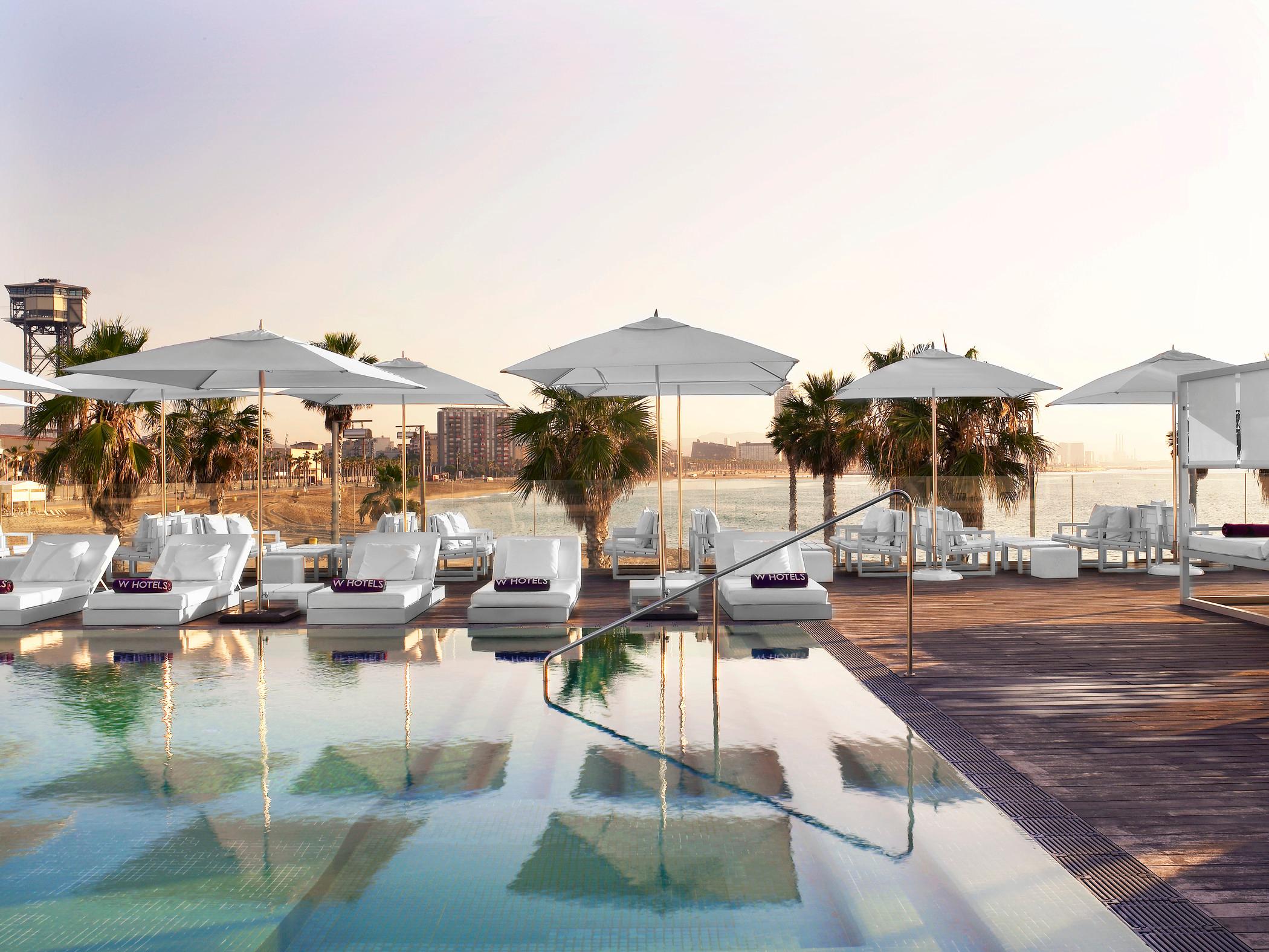 WET Deck infinity swimming pool and luxury cabanas overlooking the sea