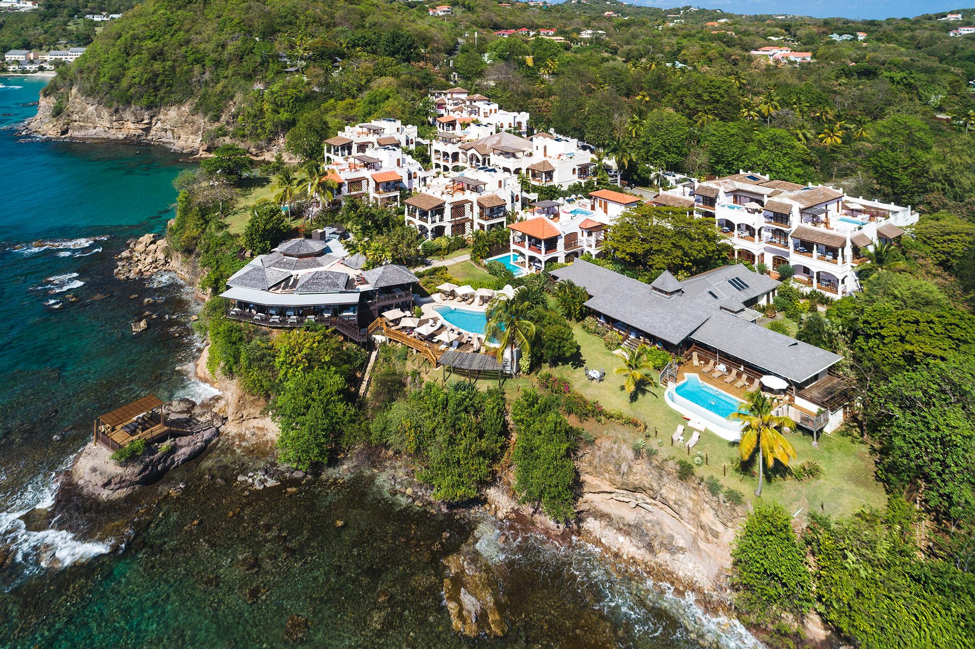 Cap Maison oceanfront bluff and tropical estate aerial view