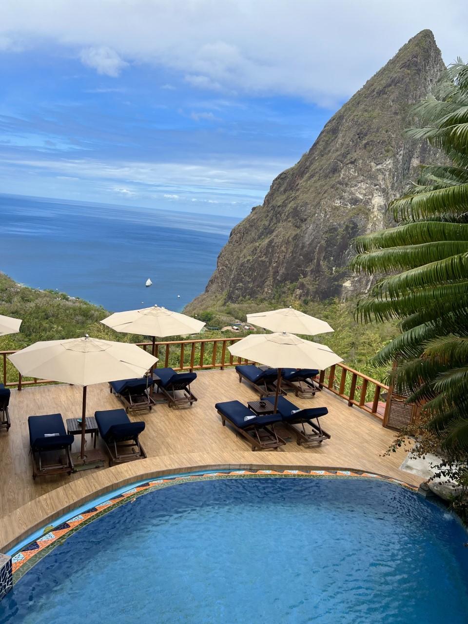 Ladera Resort main pool and deck overlooking rainforest canopy
