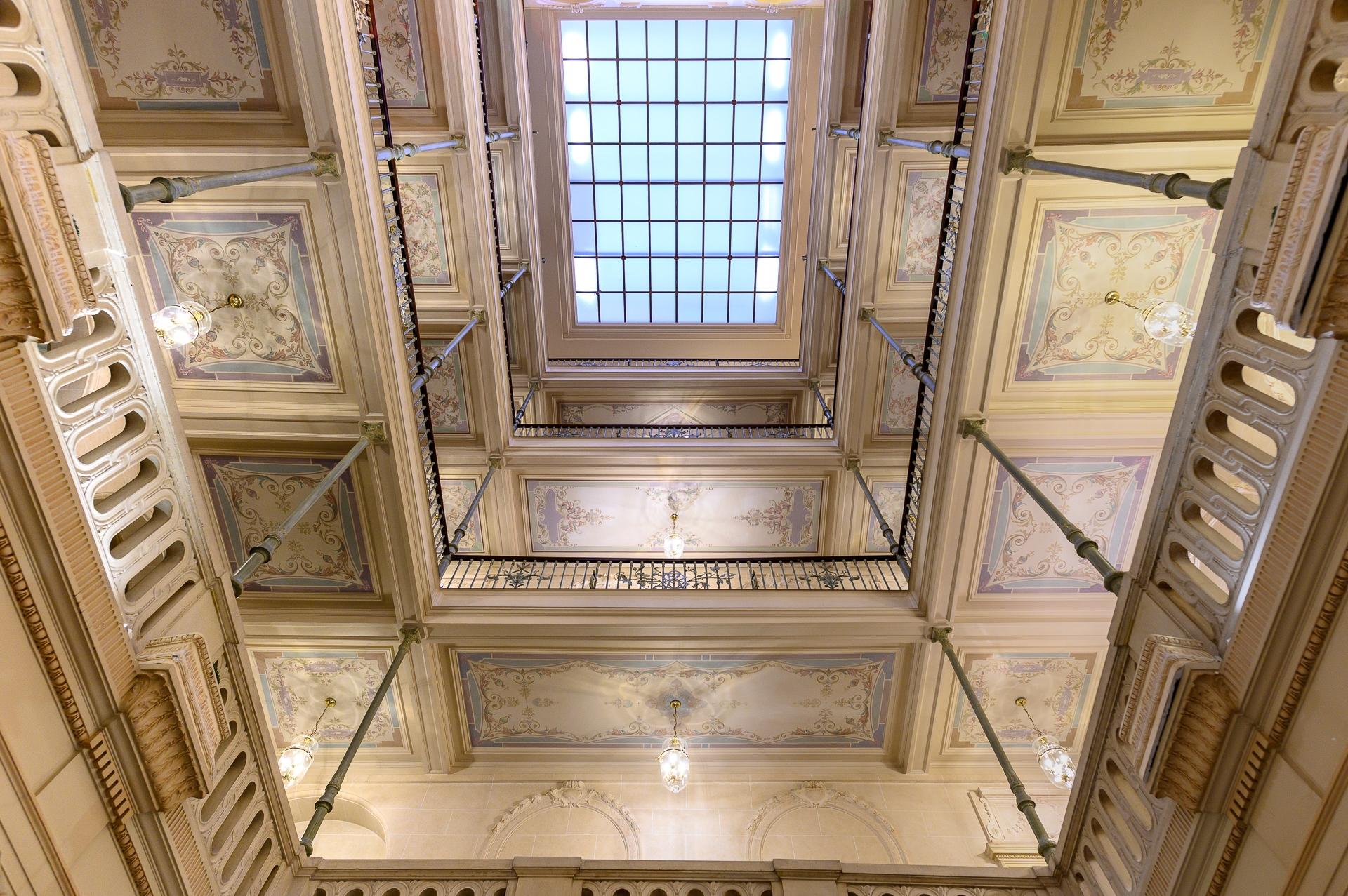 Majestic Six-Story Historic Atrium with Stained Glass Skylight