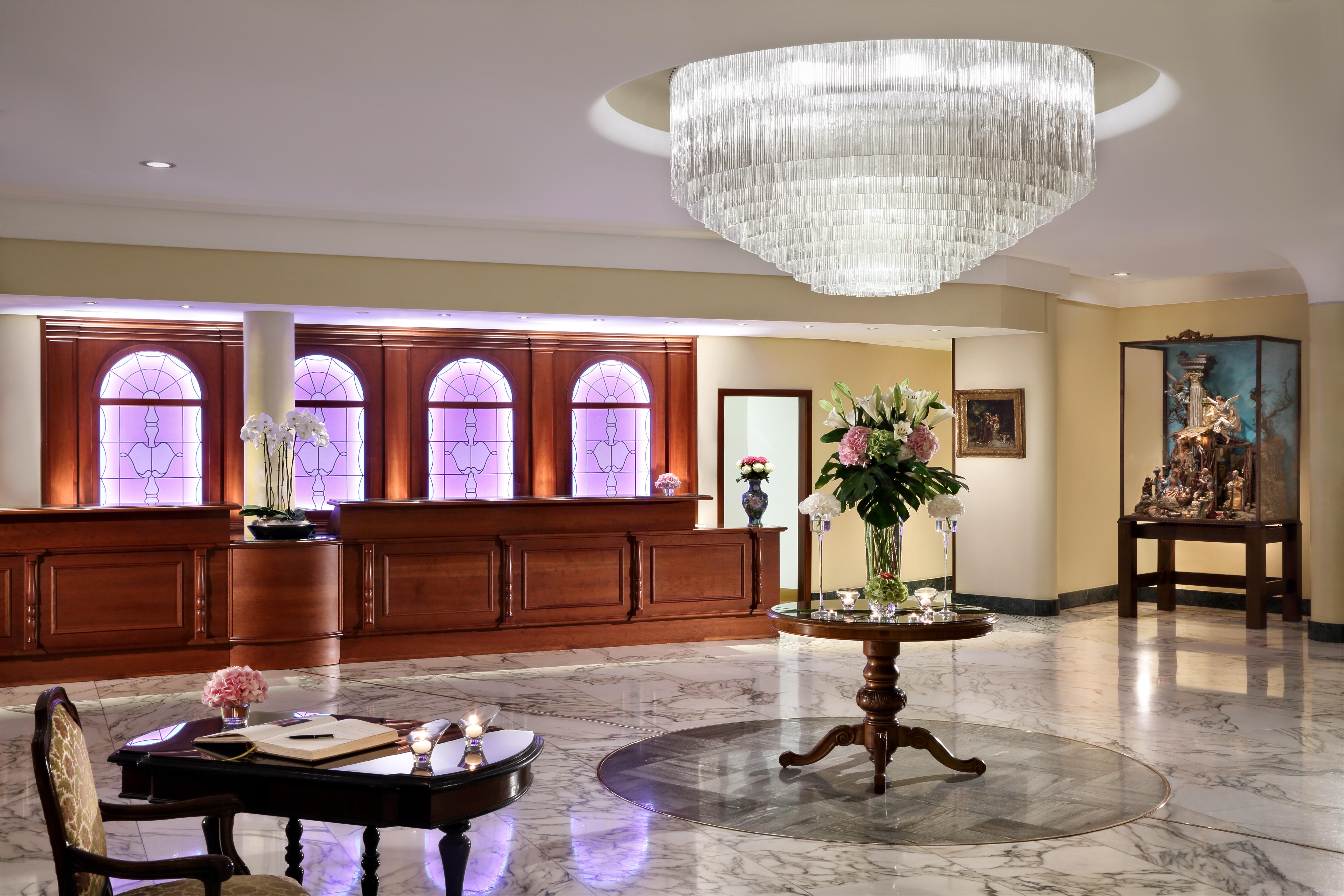 Historic Grand Lobby with Murano Chandeliers & Marble Fireplaces