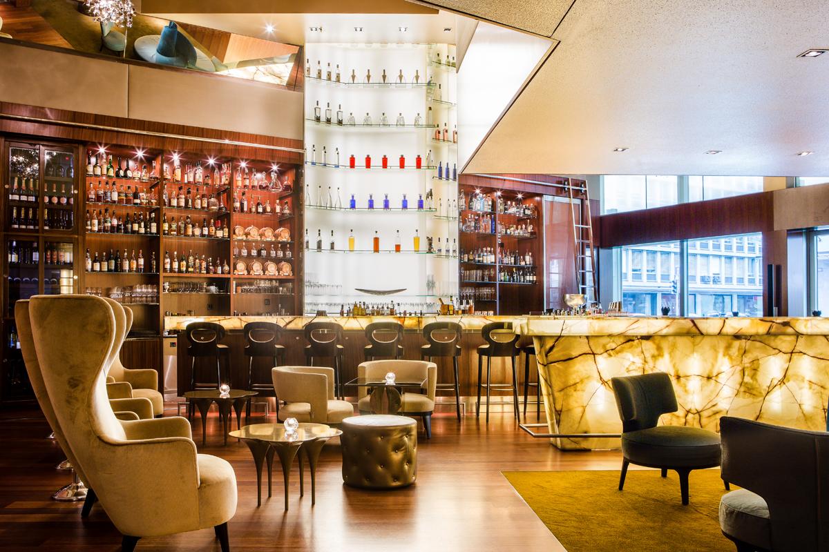 ONYX Bar with Backlit Golden Onyx Stone Counter and Summer Terrace