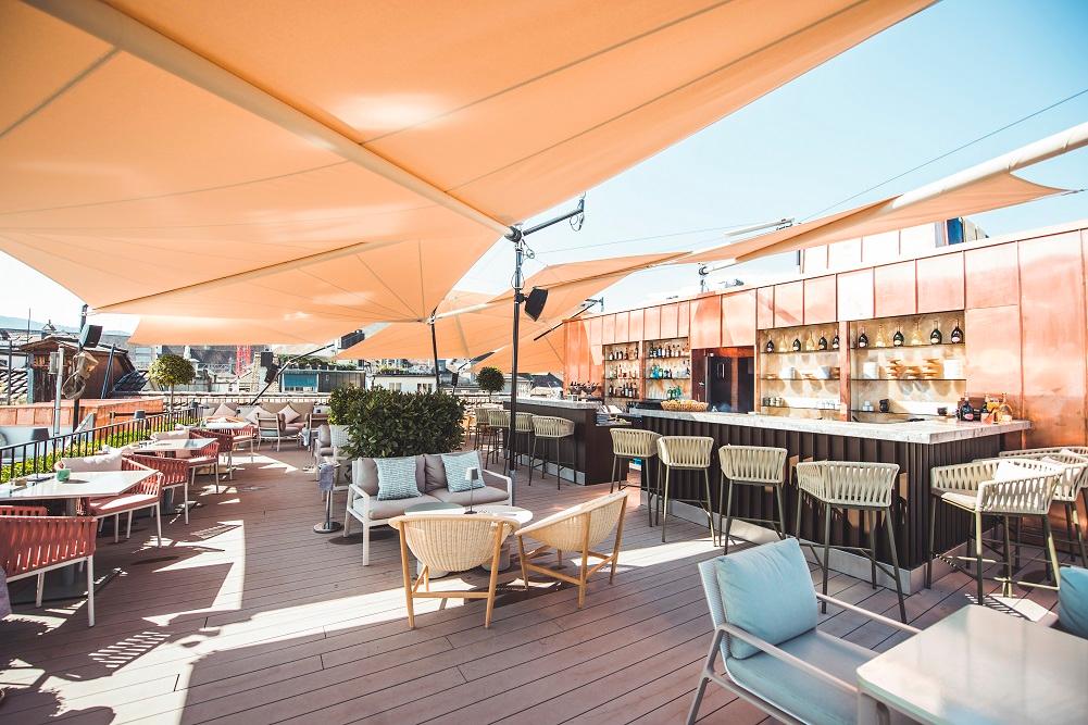 The Nest Rooftop Lounge with 360-Degree Views over Zurich Spire Towers and Alps