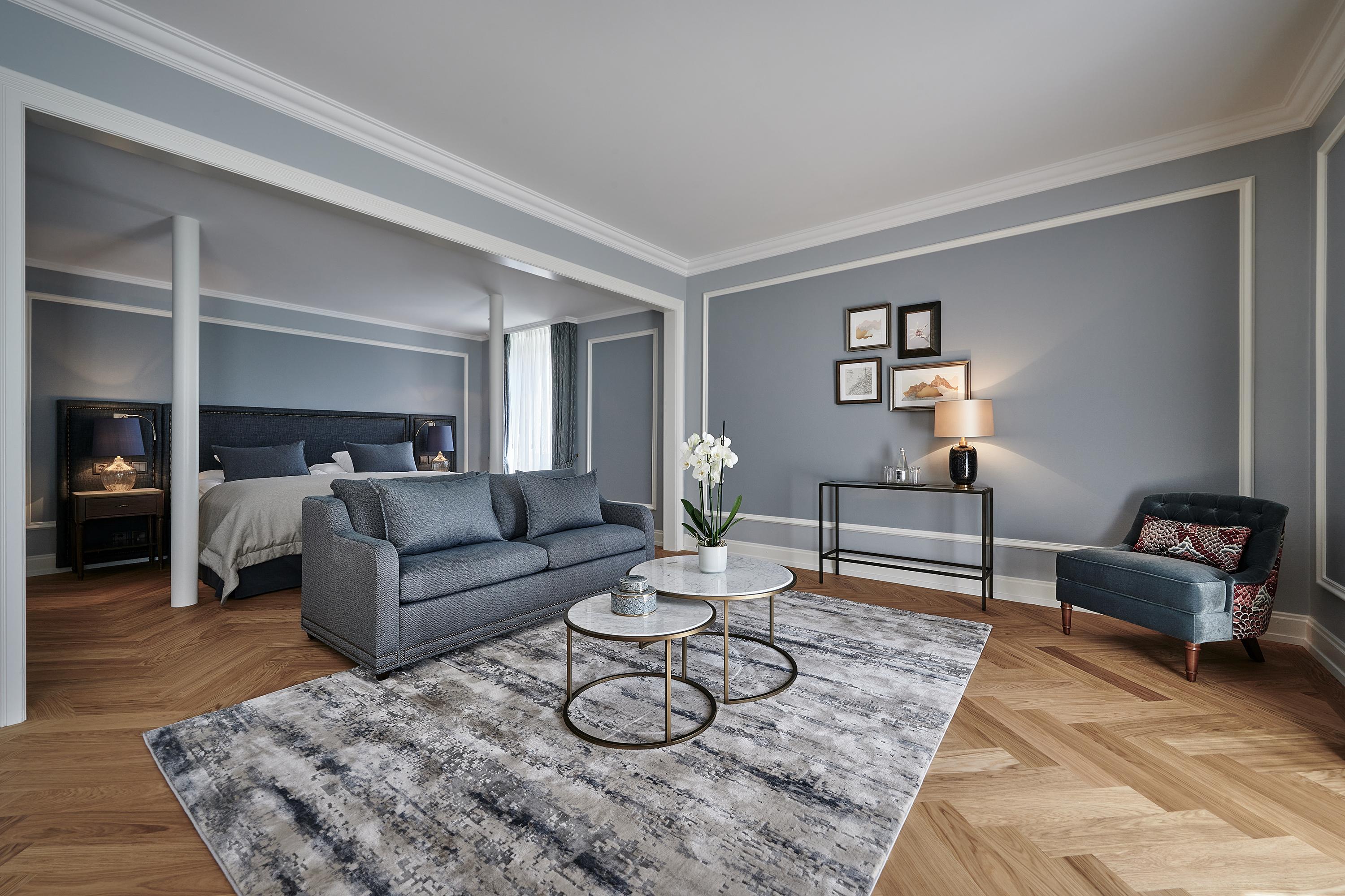 Deluxe Junior Suite with South-Facing Balcony Framing the Snow-Capped Jungfrau Massif
