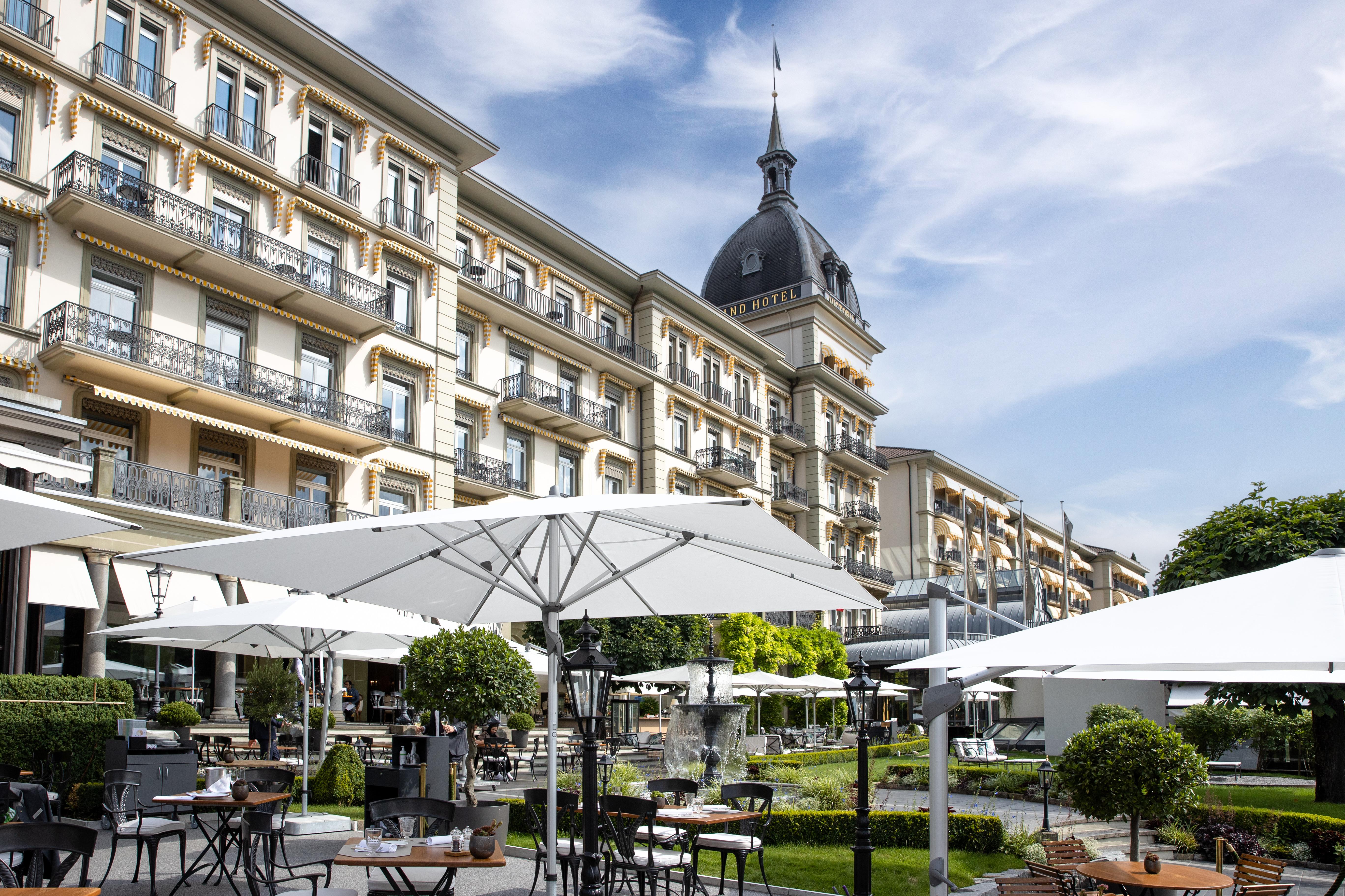 Victoria-Jungfrau Grand Hotel & Spa Historic 1865 Belle Époque Palace Façade Across Höhematte Park