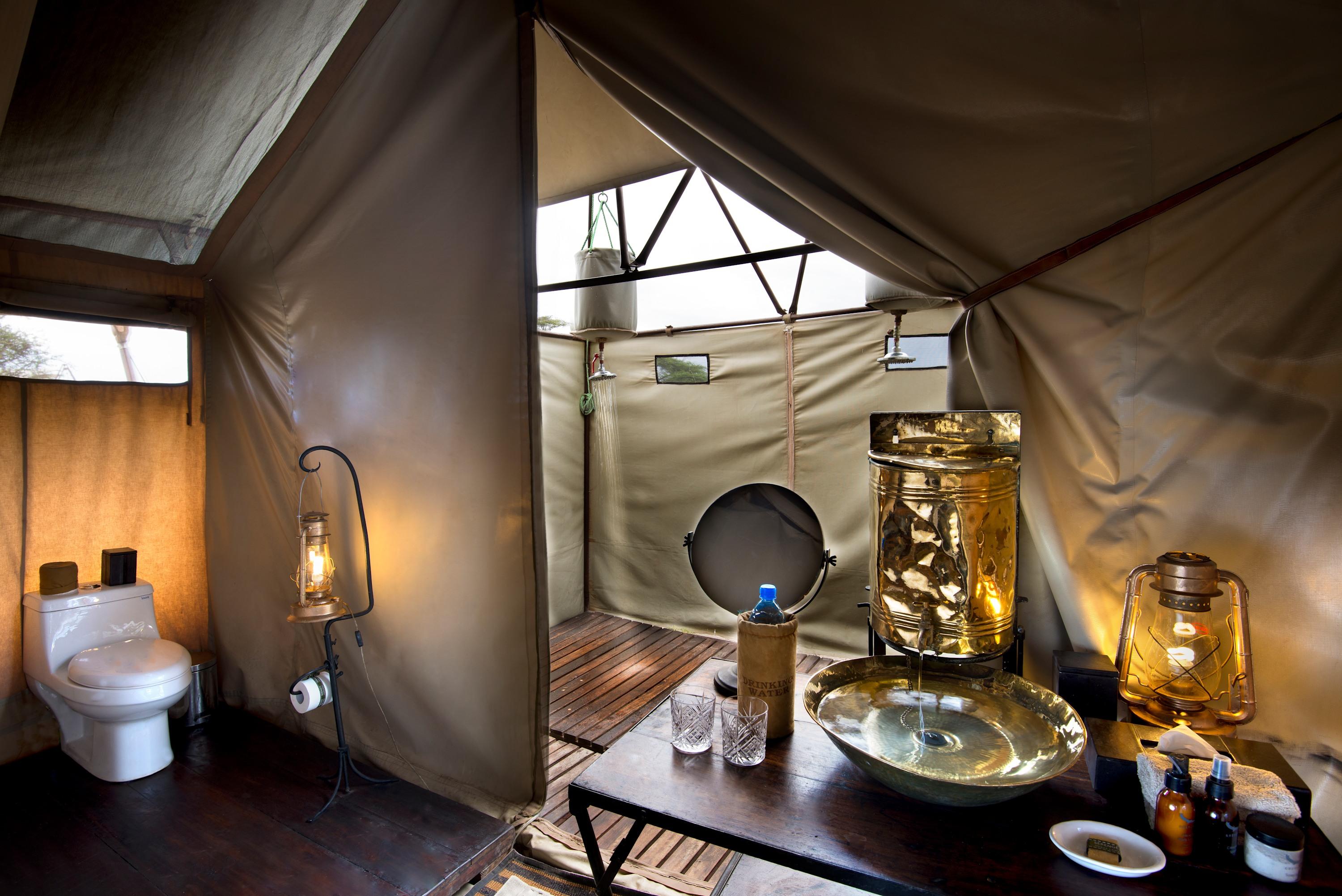 Ensuite Safari Bathroom with Brass Basins and Mirror