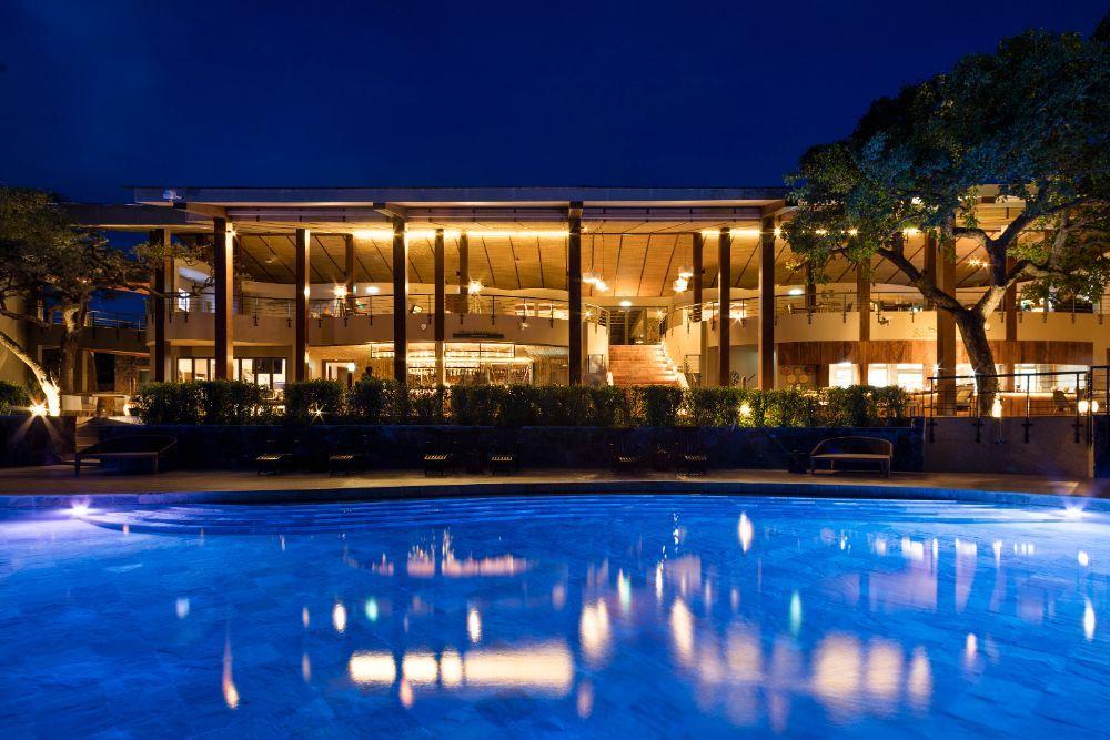 Infinity Pool Illuminated Under African Stars