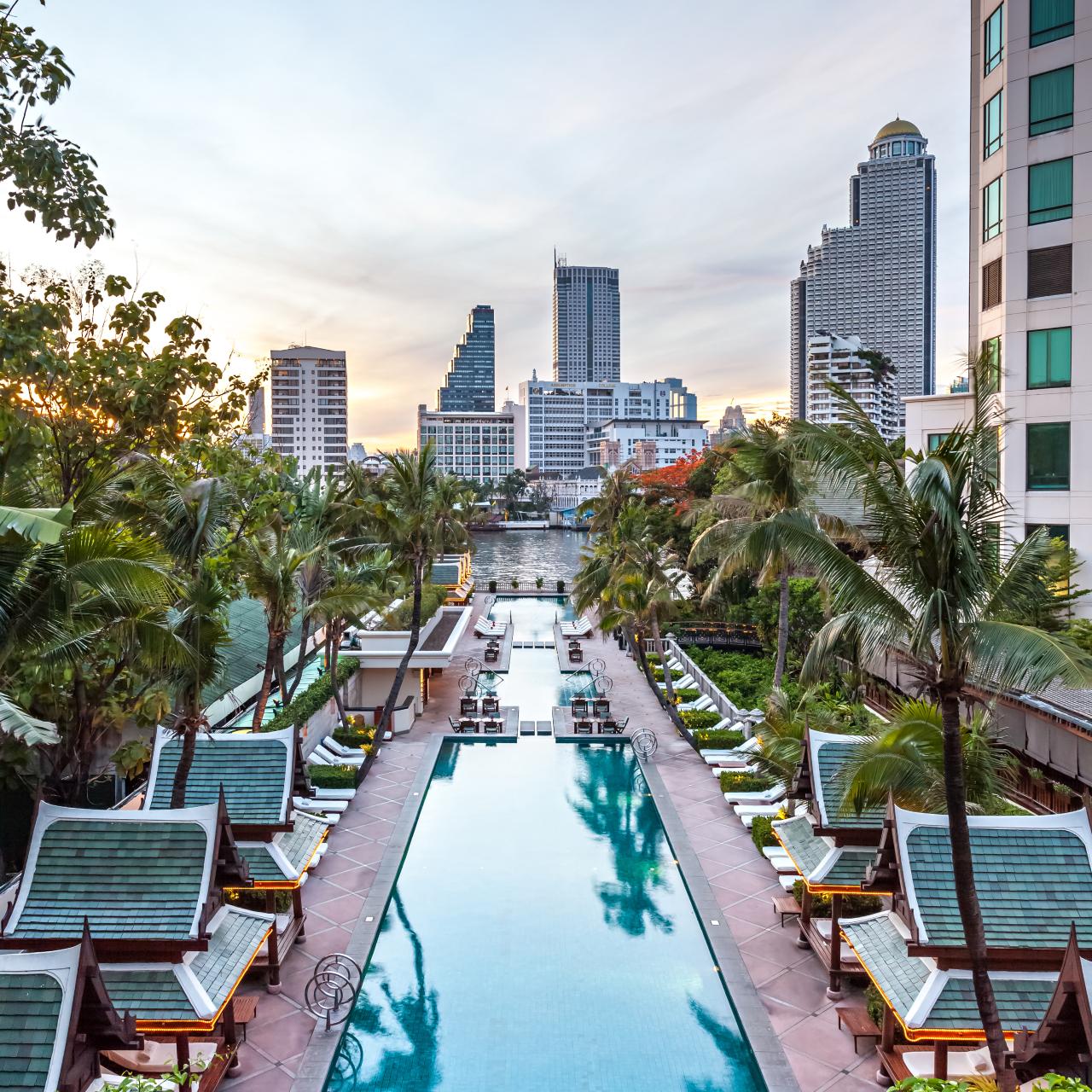 The Peninsula Bangkok three-tiered cascading swimming pool and Thai salas