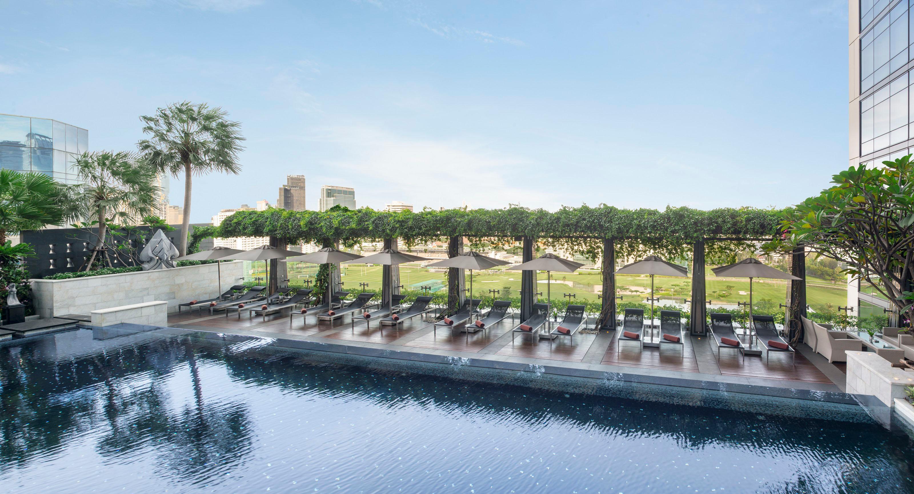 The St. Regis Bangkok elevated swimming pool overlooking golf course