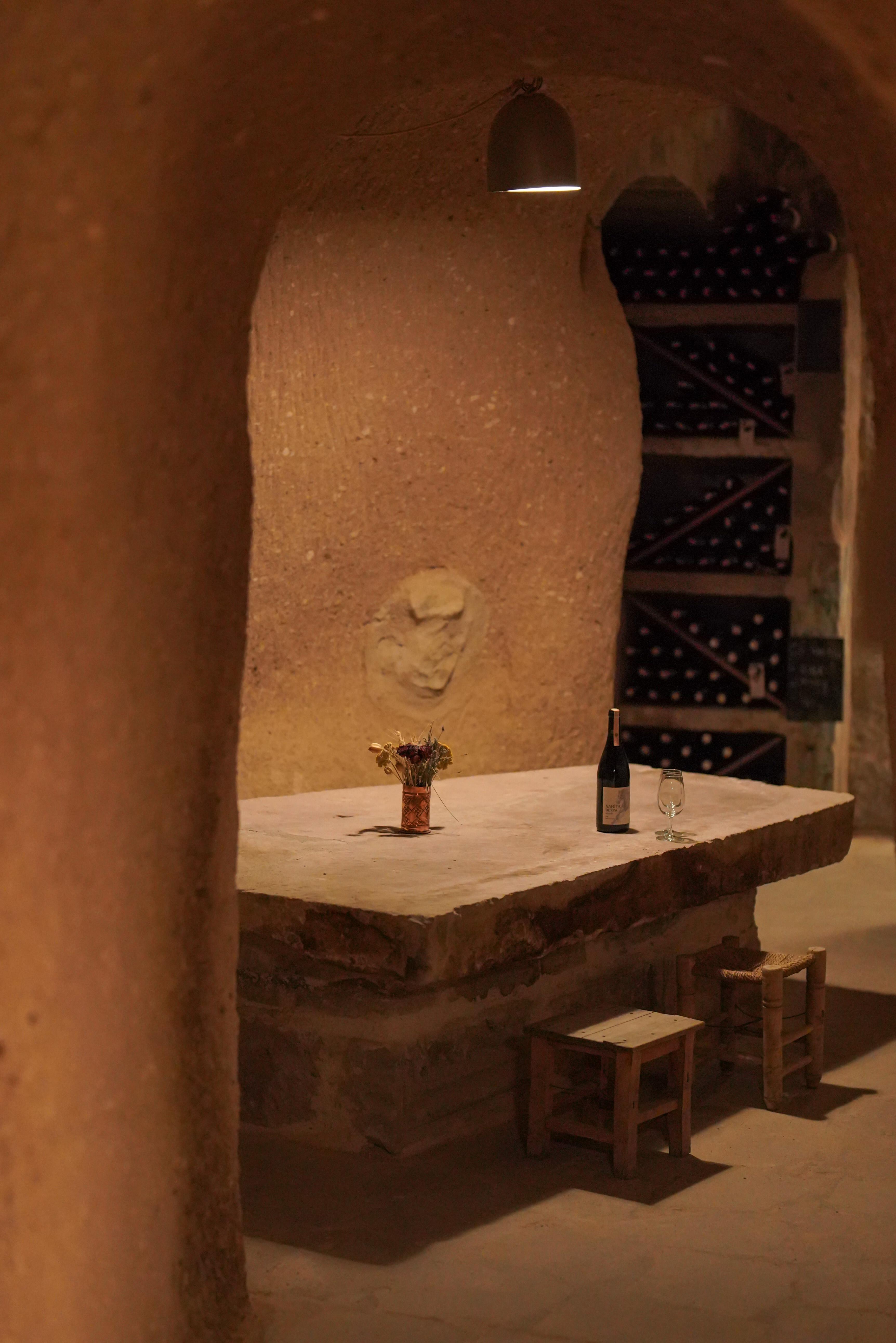 Ancient natural underground wine cellar housing thousands of Anatolian vintages