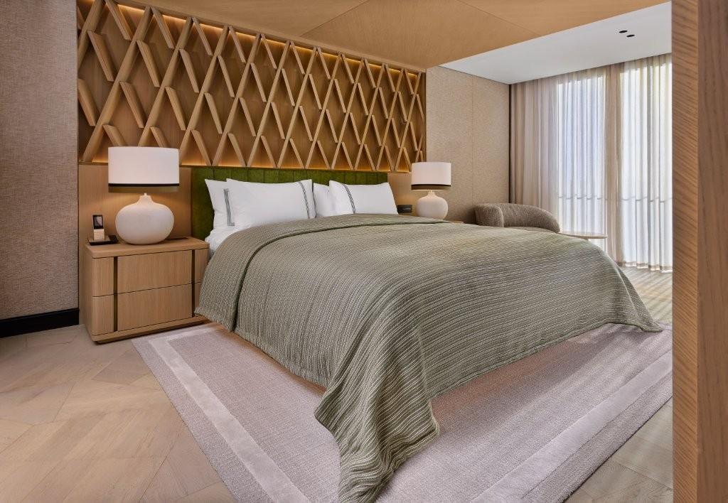 Signature Suite master bedroom and dressing salon