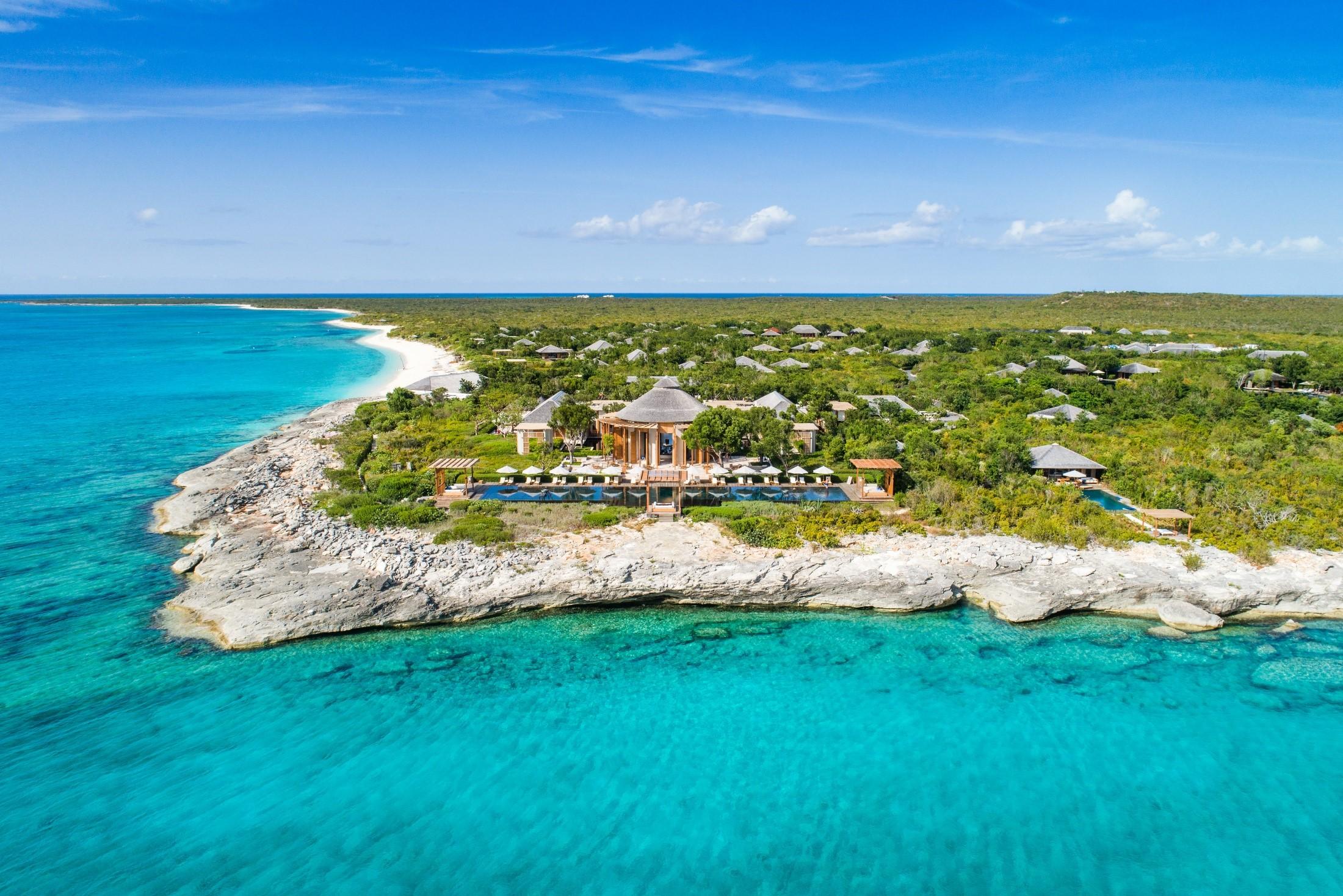 Pristine white sand Malcolm Road Beach cove and turquoise Caribbean waters at Amanyara