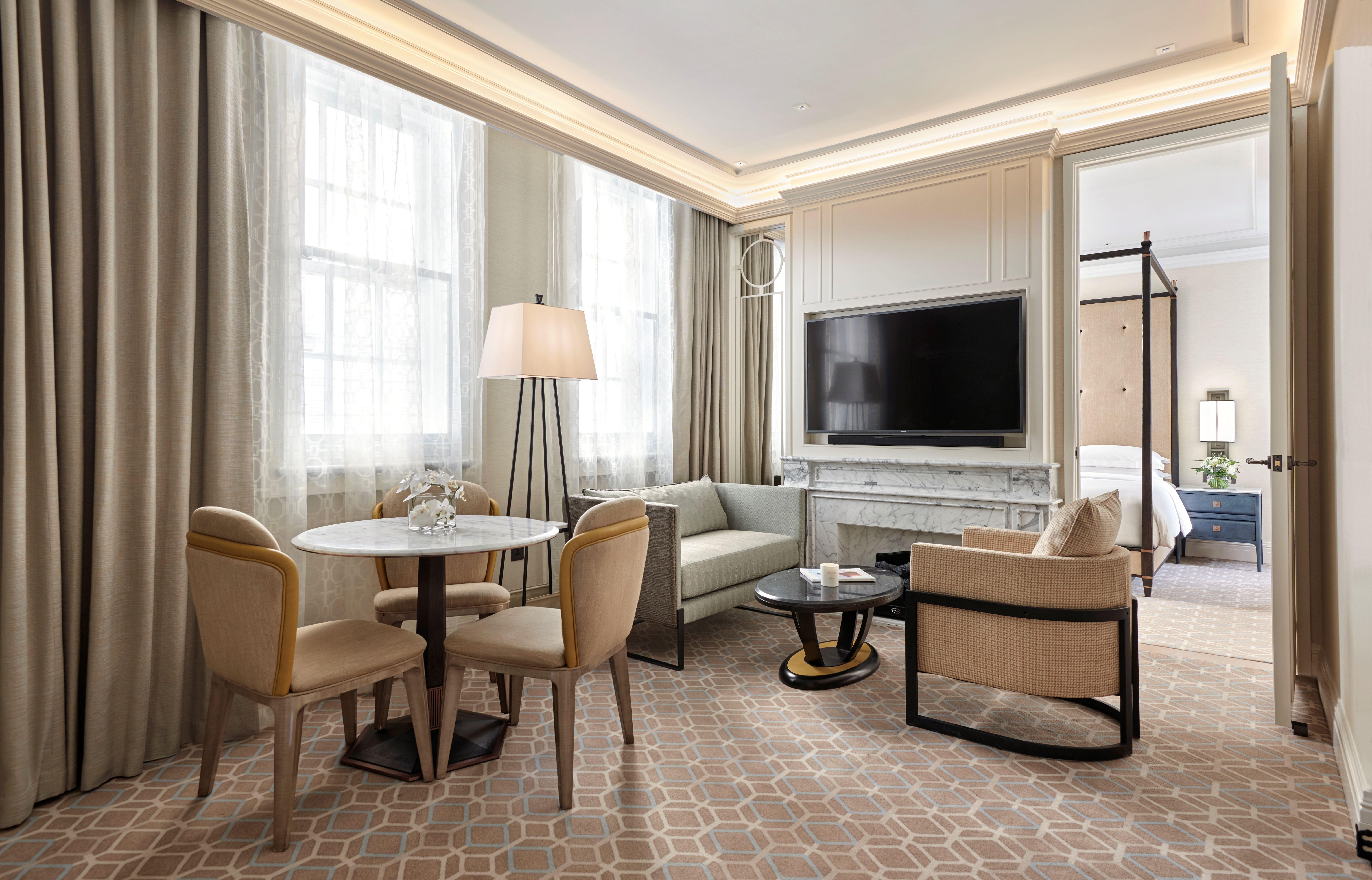 The Sherlock Suite Living Salon with Marble Fireplace