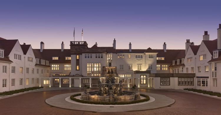 Trump Turnberry Courtyard and Illuminated Resort Facade at Dusk