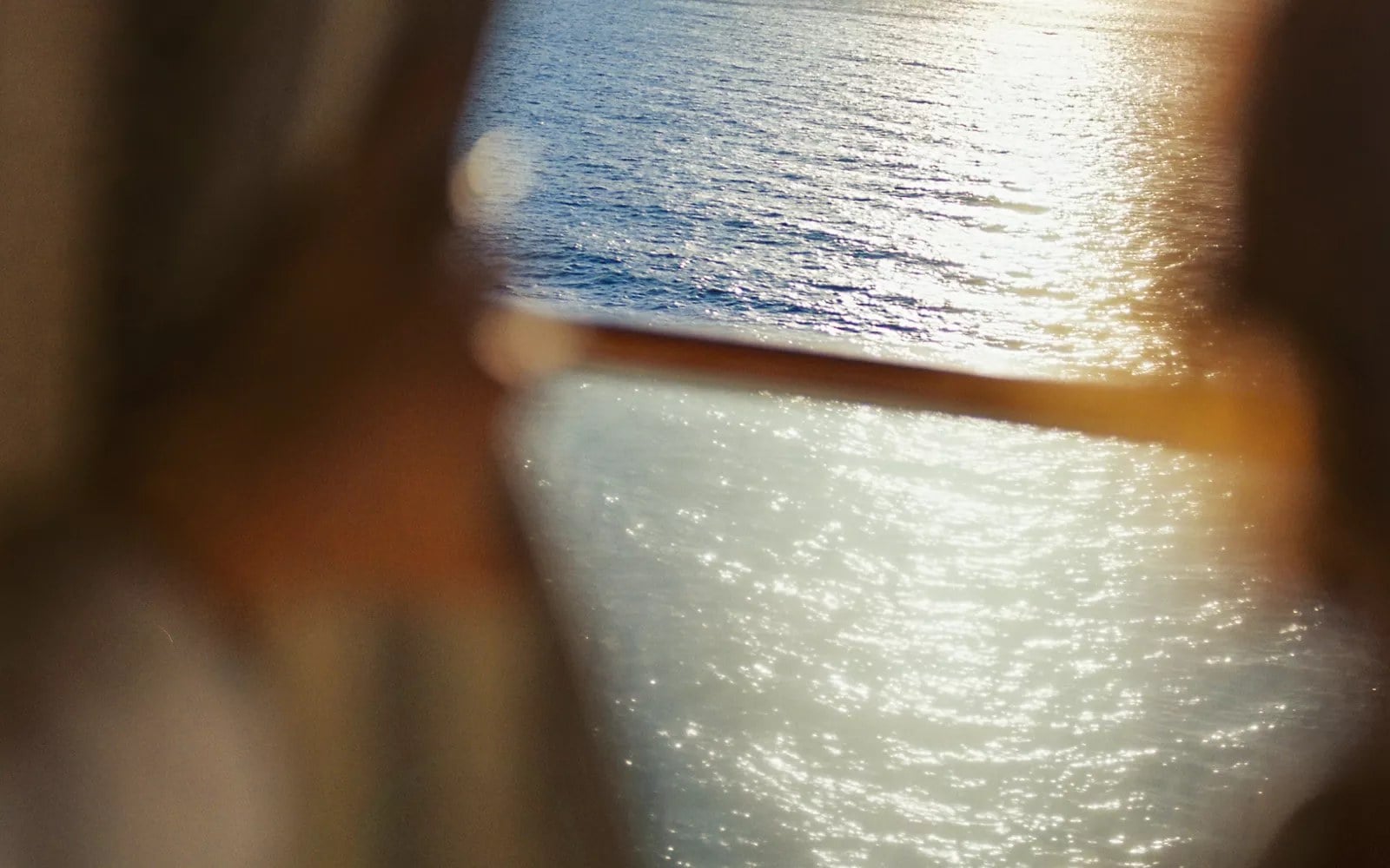 Explora Journeys Ocean Penthouse suite featuring private oceanfront terrace with daybeds