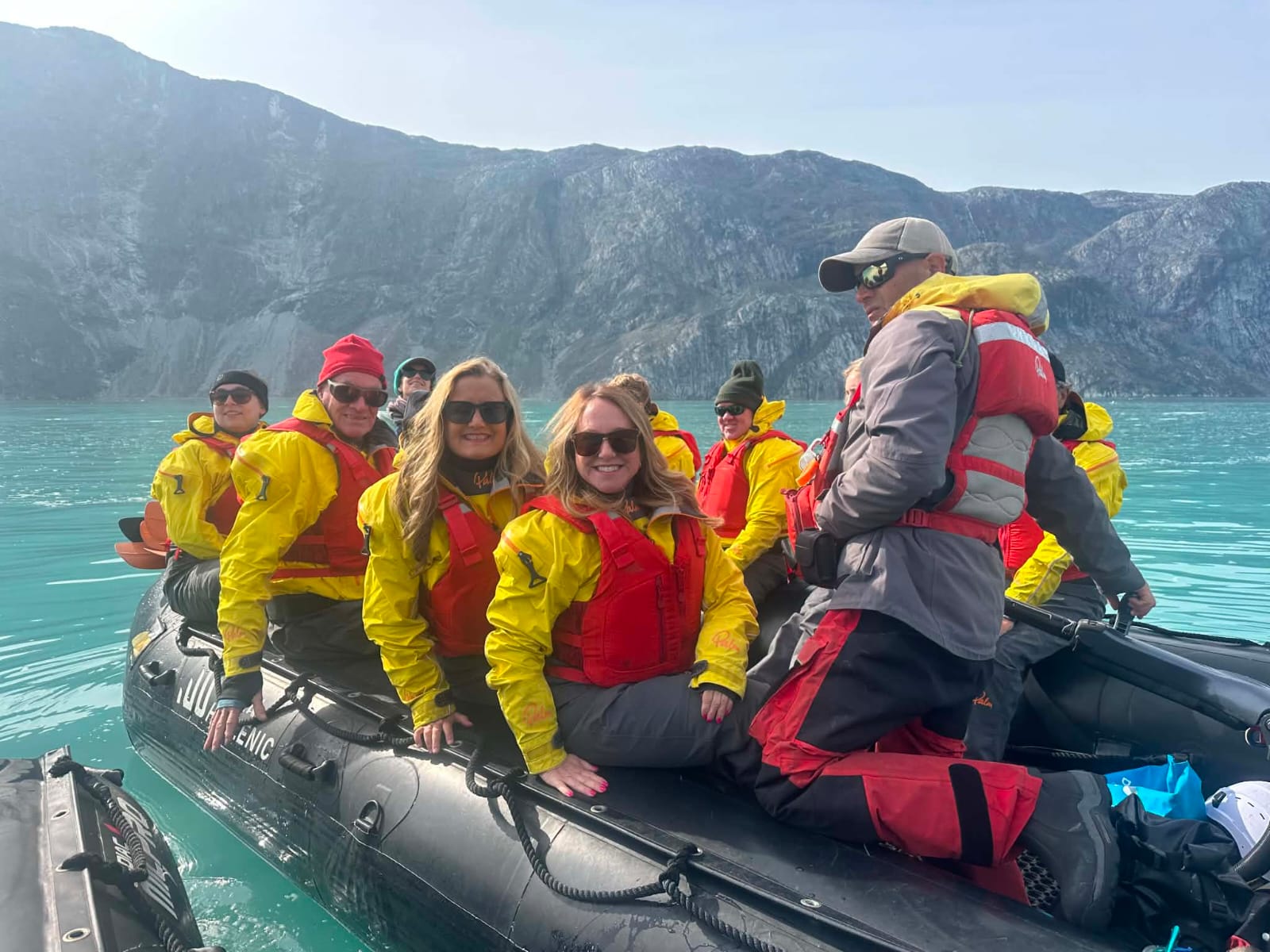 Kayaking group approaching the massive face of Nigerdlikasik Glacier