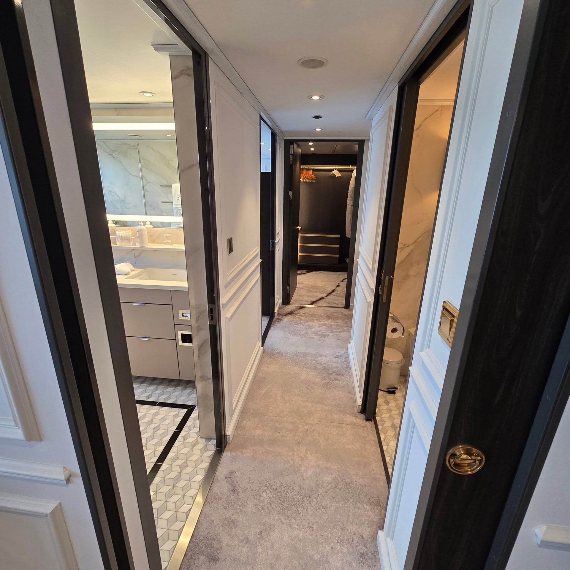 Looking down the private foyer of a grand suite on Riverside Debussy
