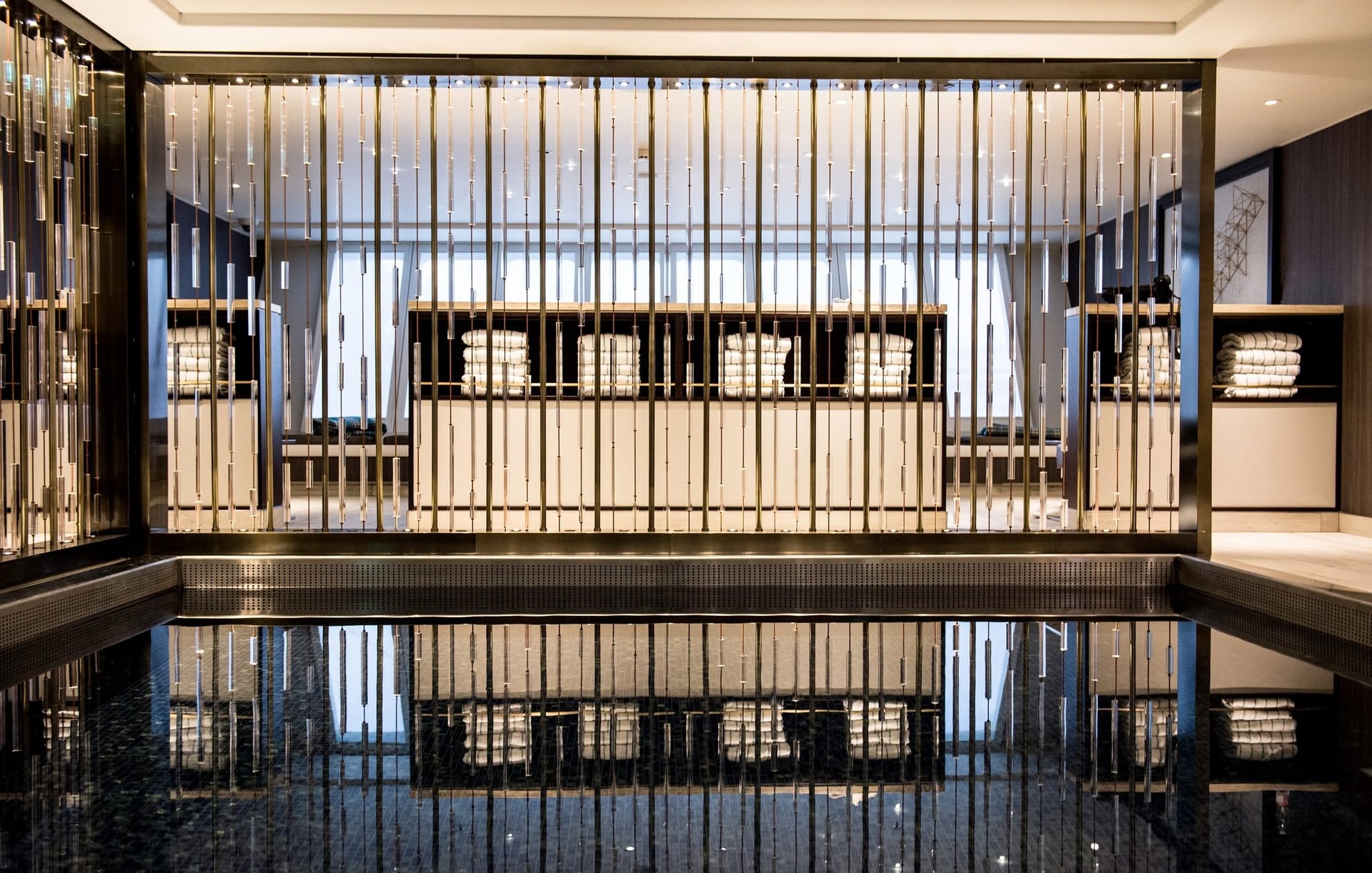 Indoor heated counter-current lap pool and hydrotherapy spa on Riverside Debussy