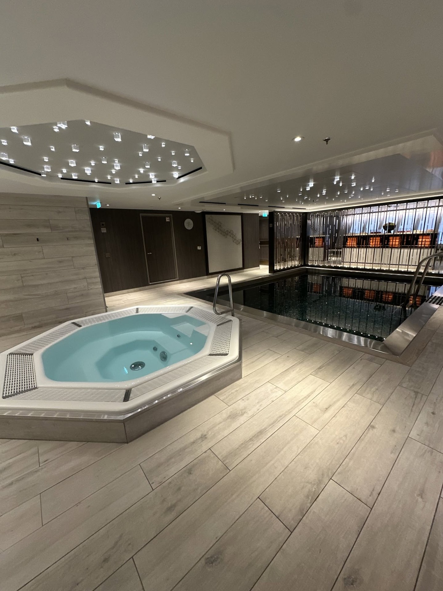 Indoor spa wellness area with heated whirlpool hot tub on Riverside Debussy