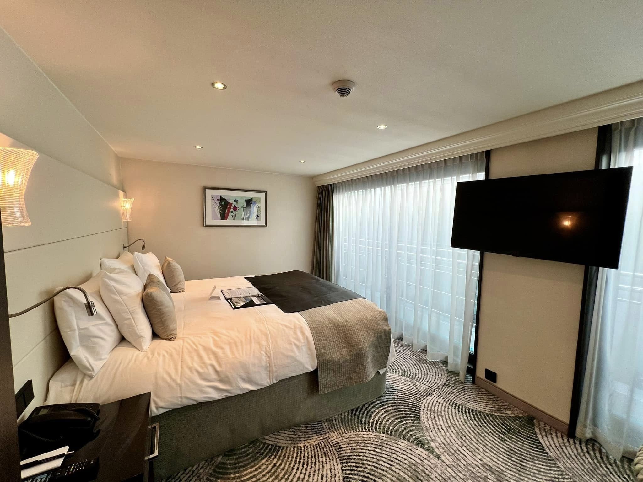 Tauck Category 7 Suite Master Bedroom with King Bed Facing Danube