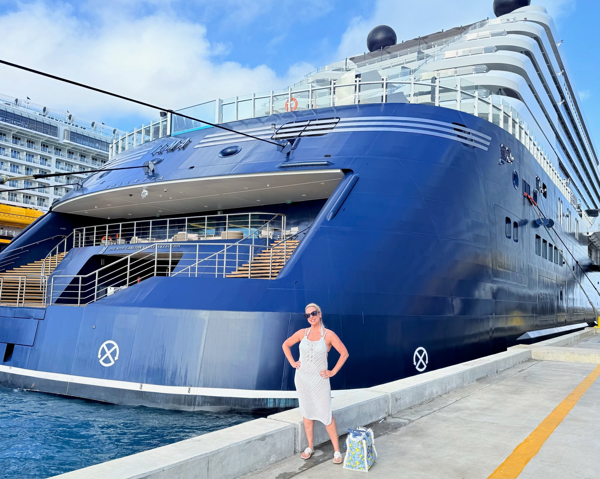 The sleek navy blue hull of The Ritz-Carlton Yacht Collection Ilma superyacht