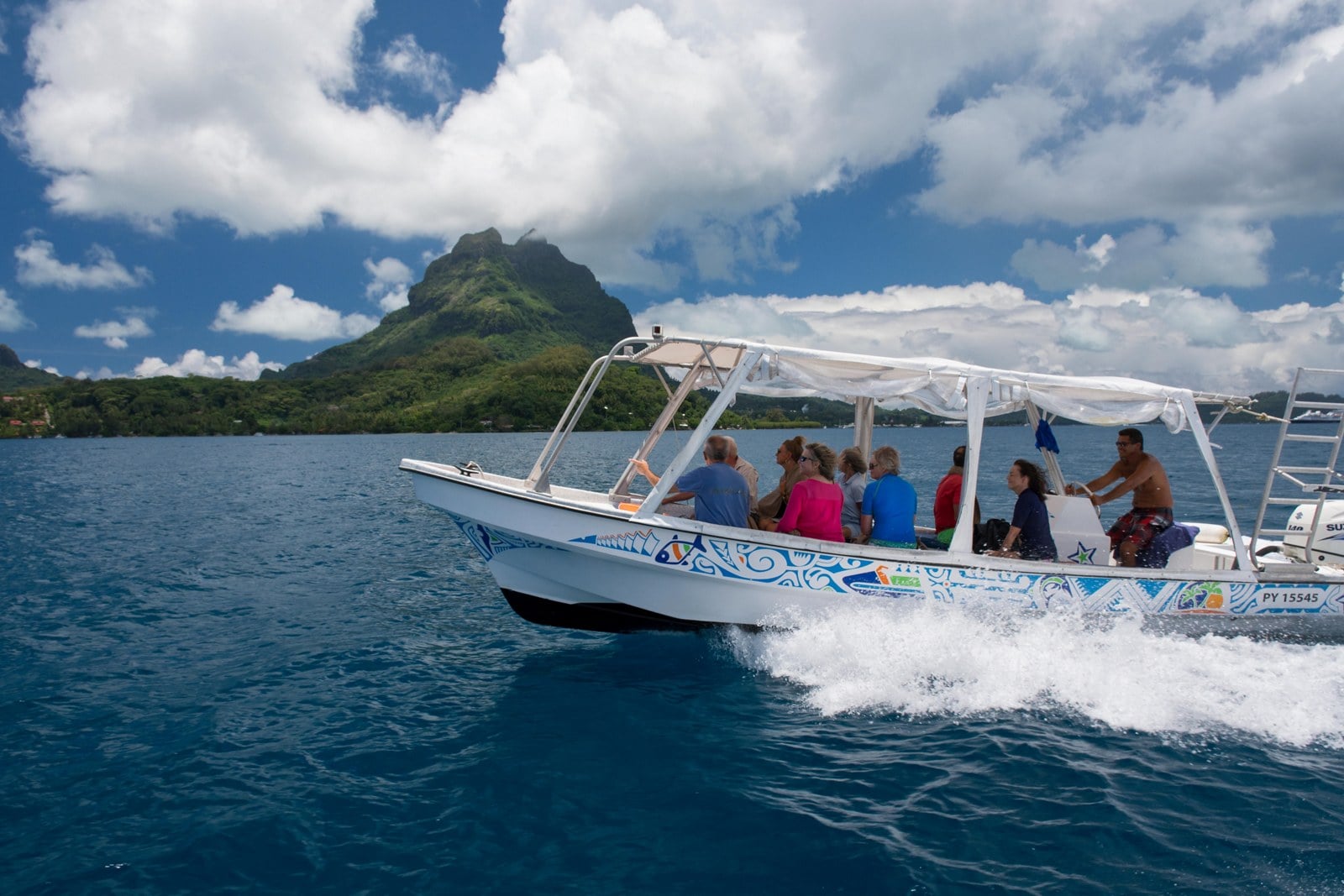Viking travelers exploring the turquoise waters and volcanic peaks of Bora Bora on a shore excursion