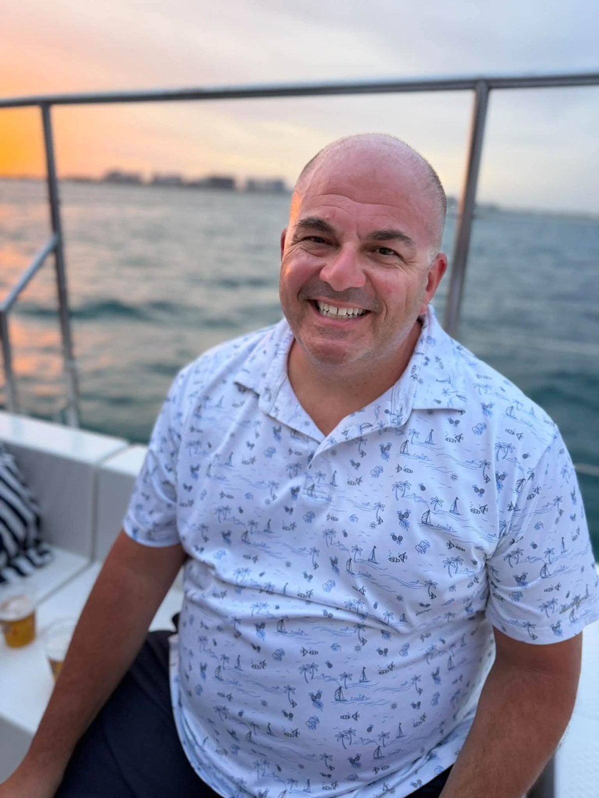 Joe sailing toward Isla Mujeres during the private sunset catamaran charter